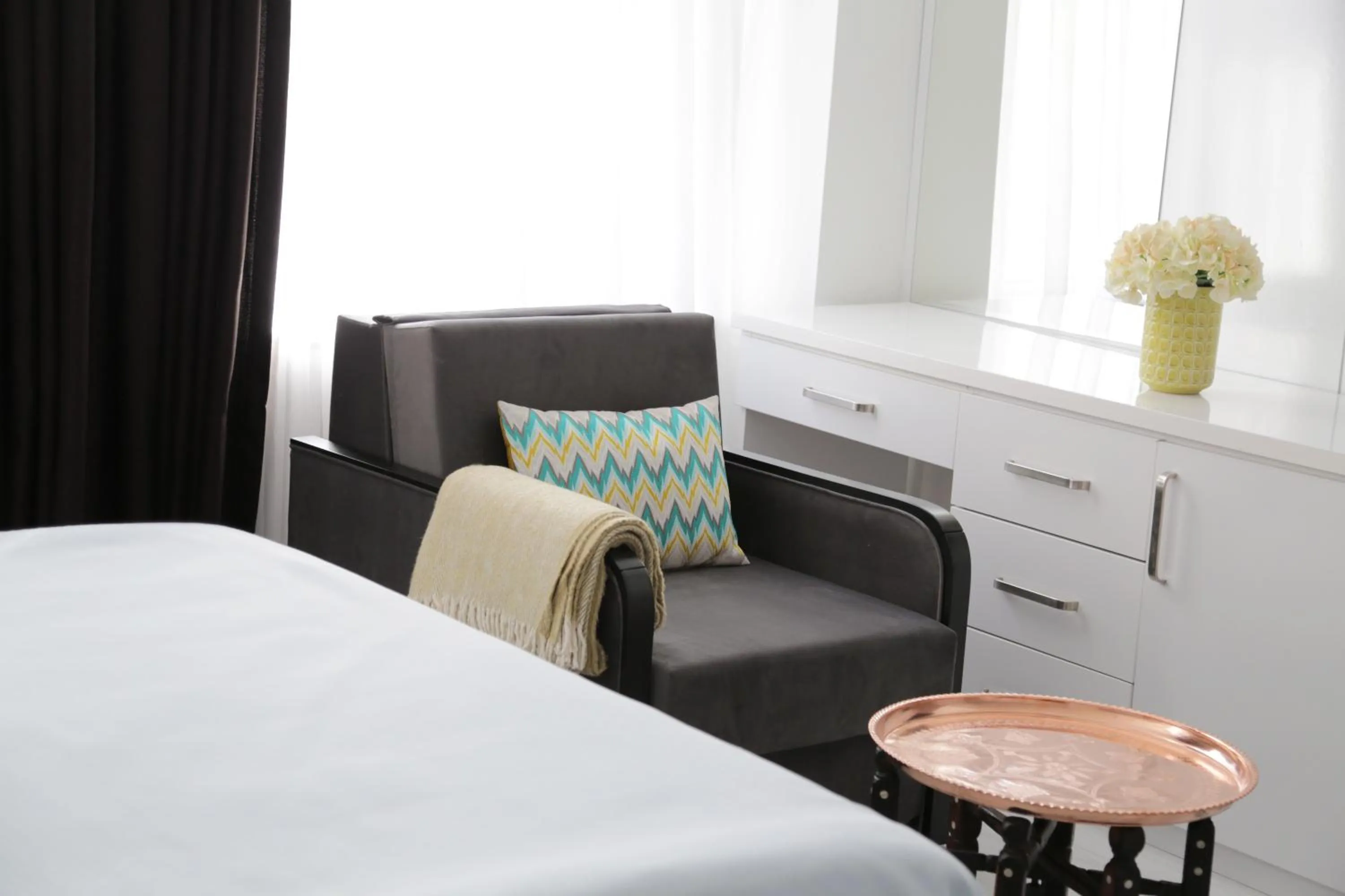 Seating area, Bed in Bayer Hotel