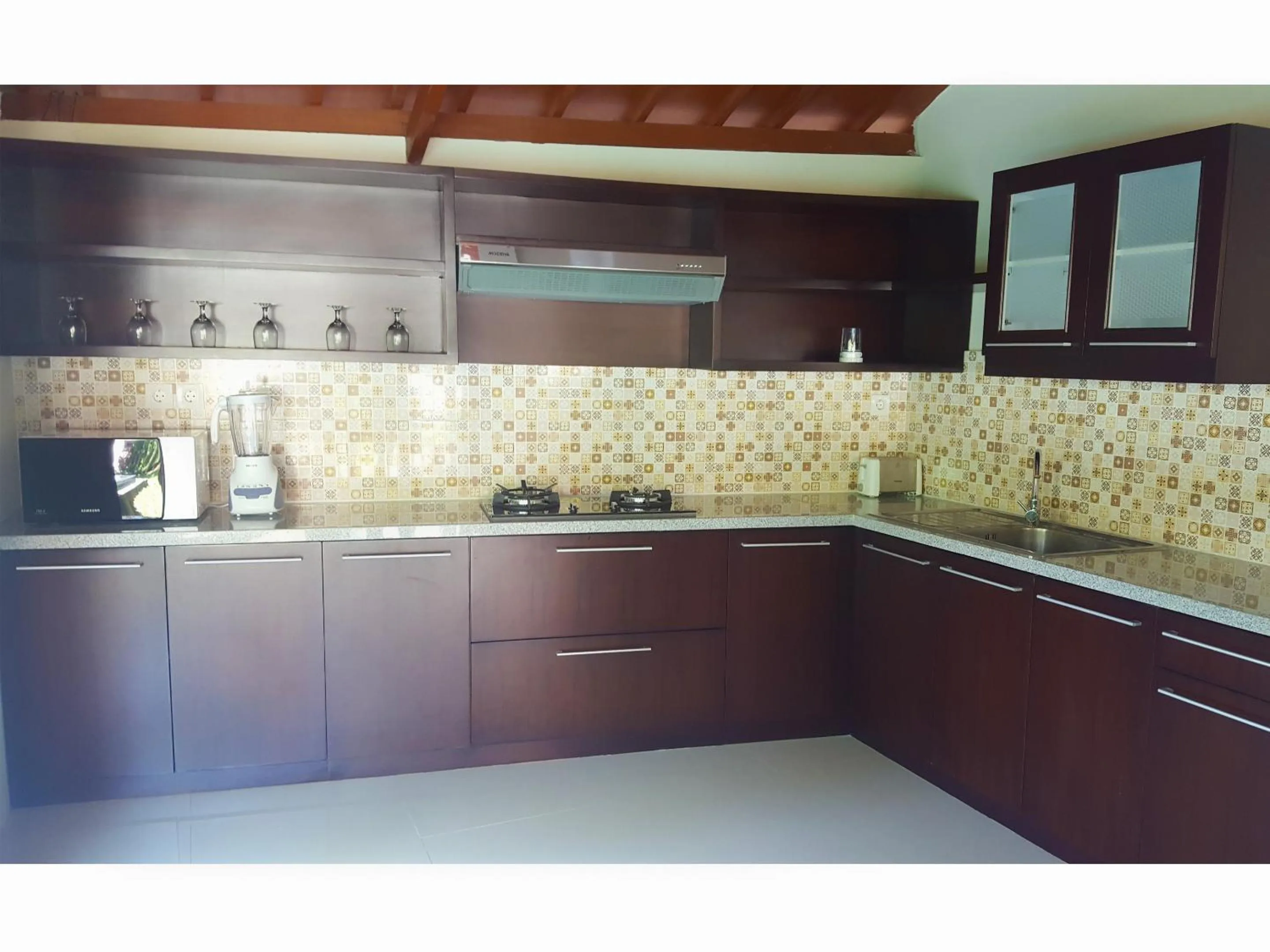 Kitchen or kitchenette in Juada Garden