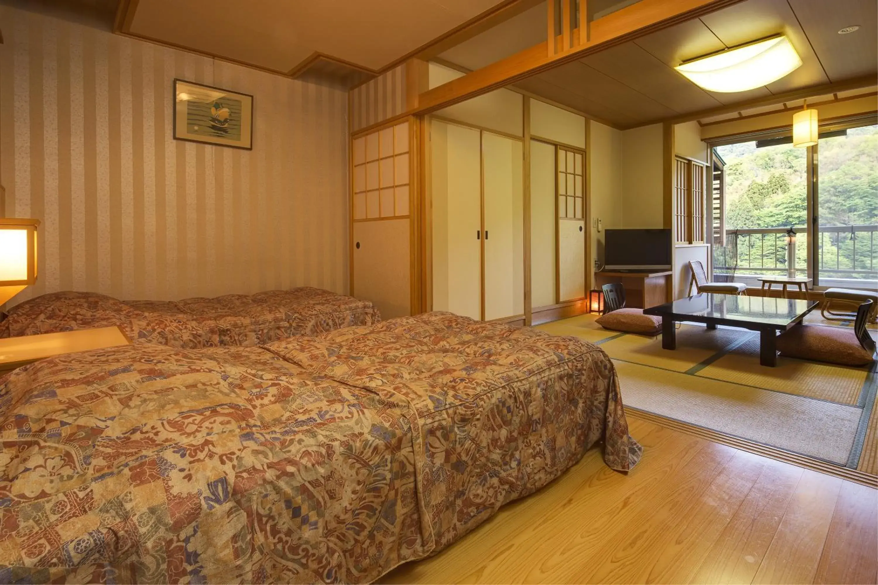 Bed in Ryokan Fushioukaku Bed in Ryokan Fushioukaku