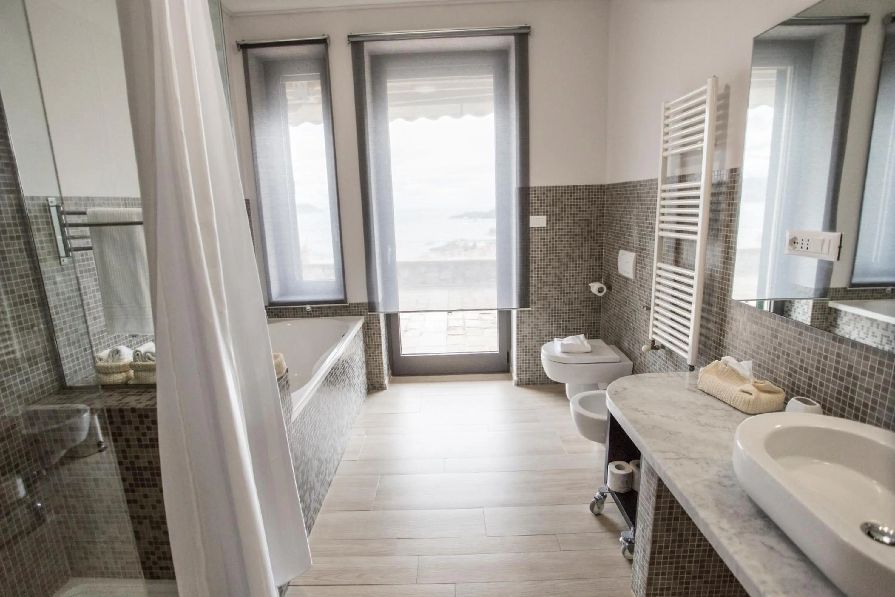 Toilet in Miramare Apartments&Suites