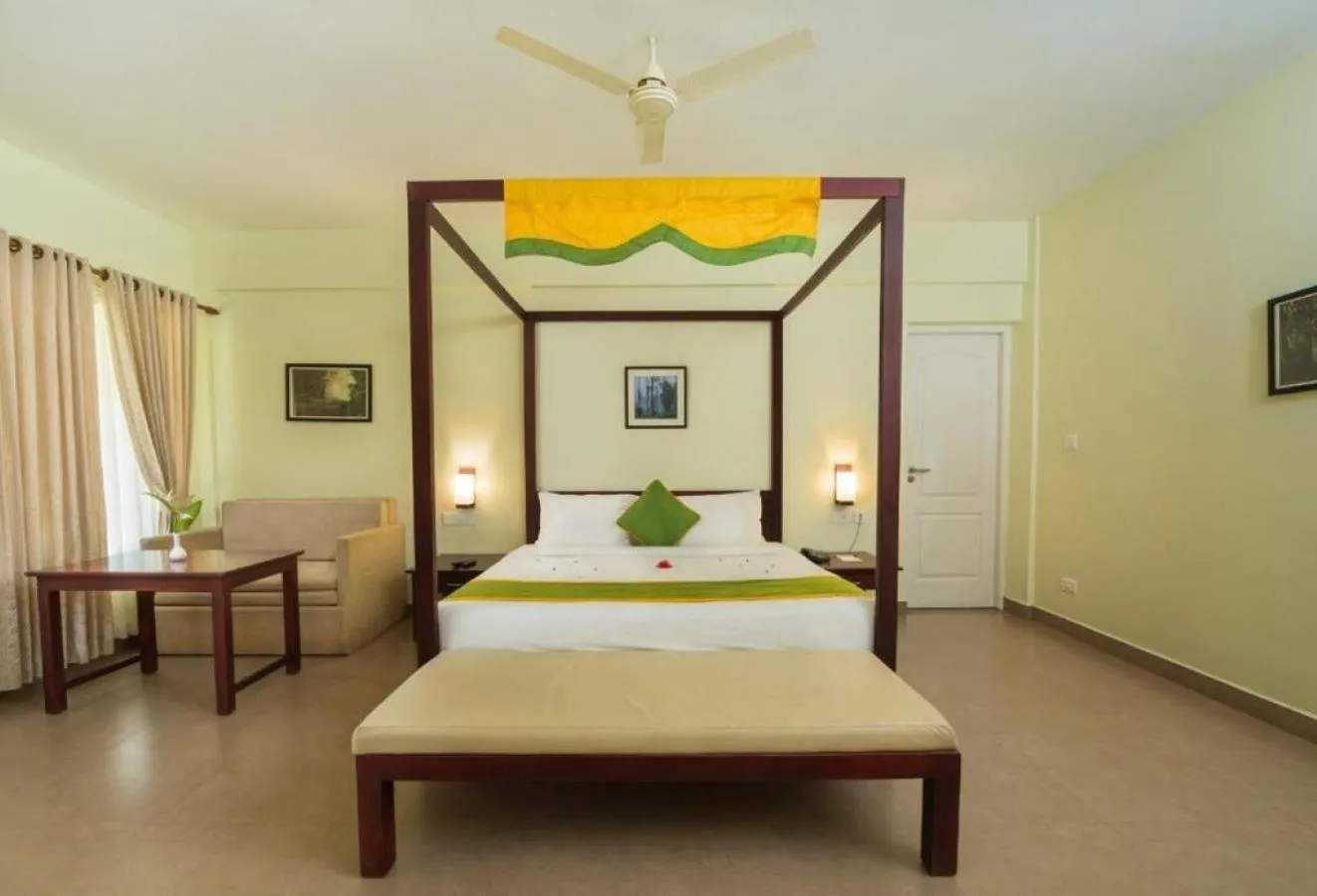 Photo of the whole room, Bed in Abad Brookside Wayanad