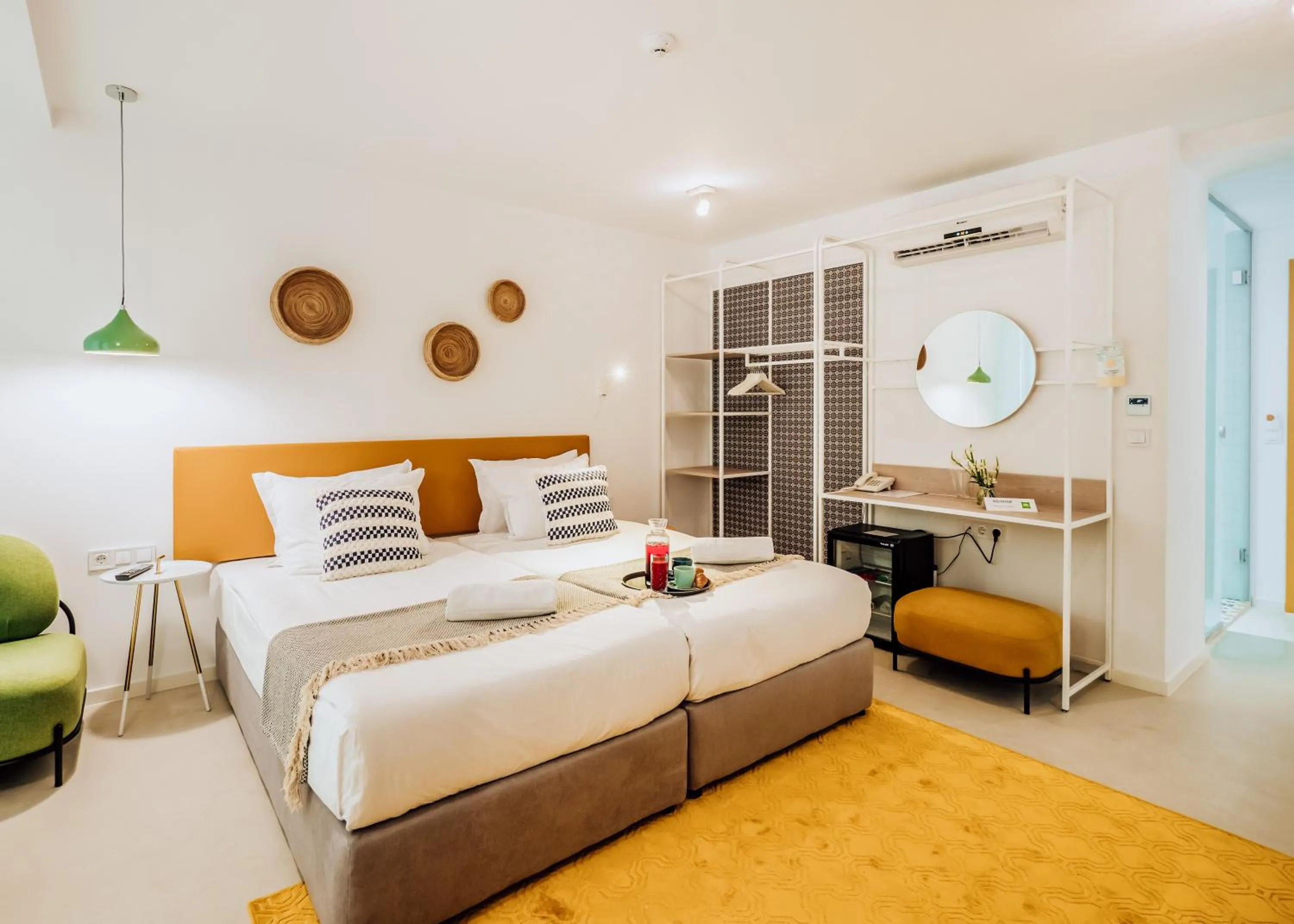 Bedroom in ibis Styles Golden Sands Roomer Hotel