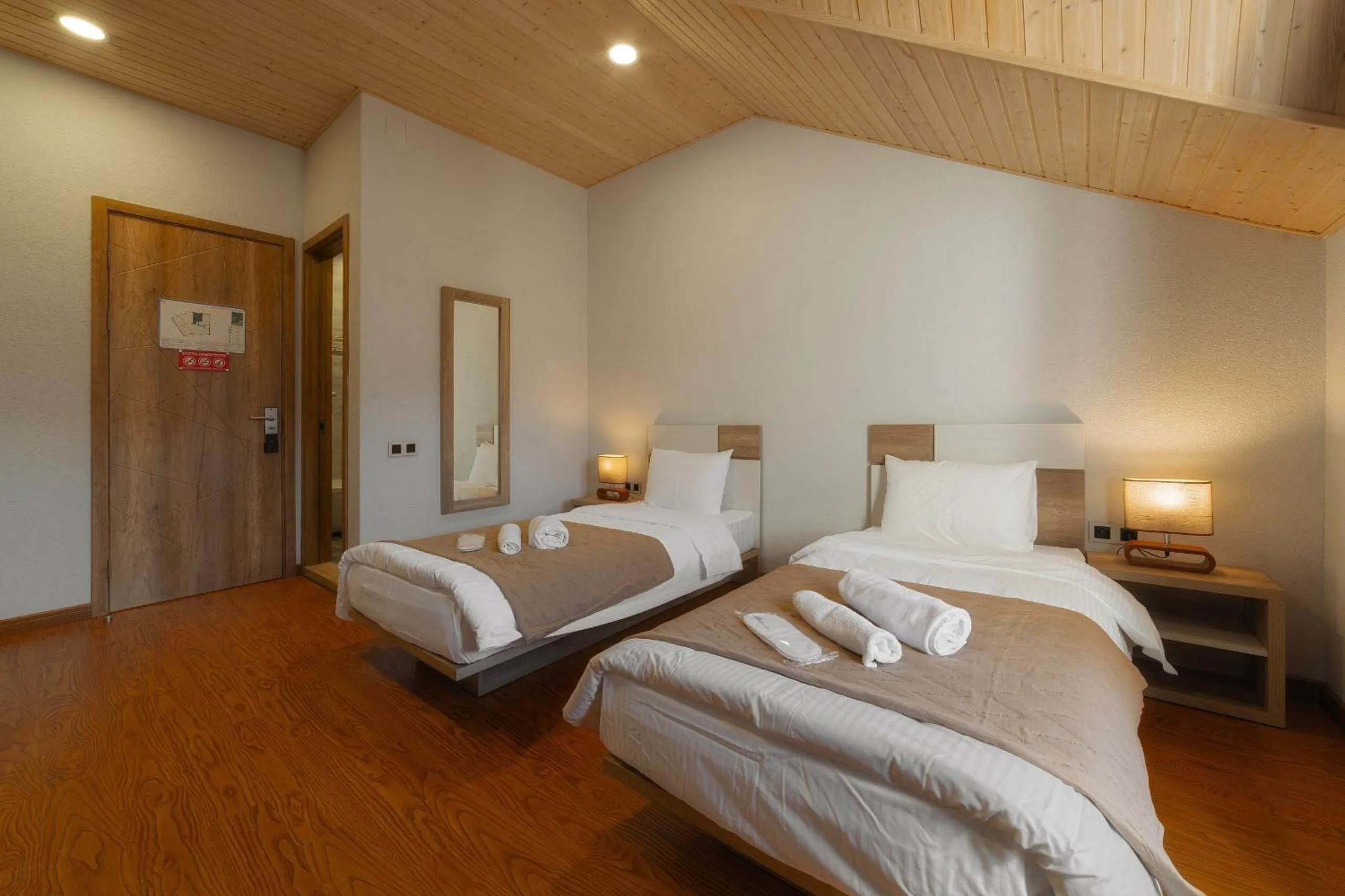 Bed in Ereto Hotel by SnowTime