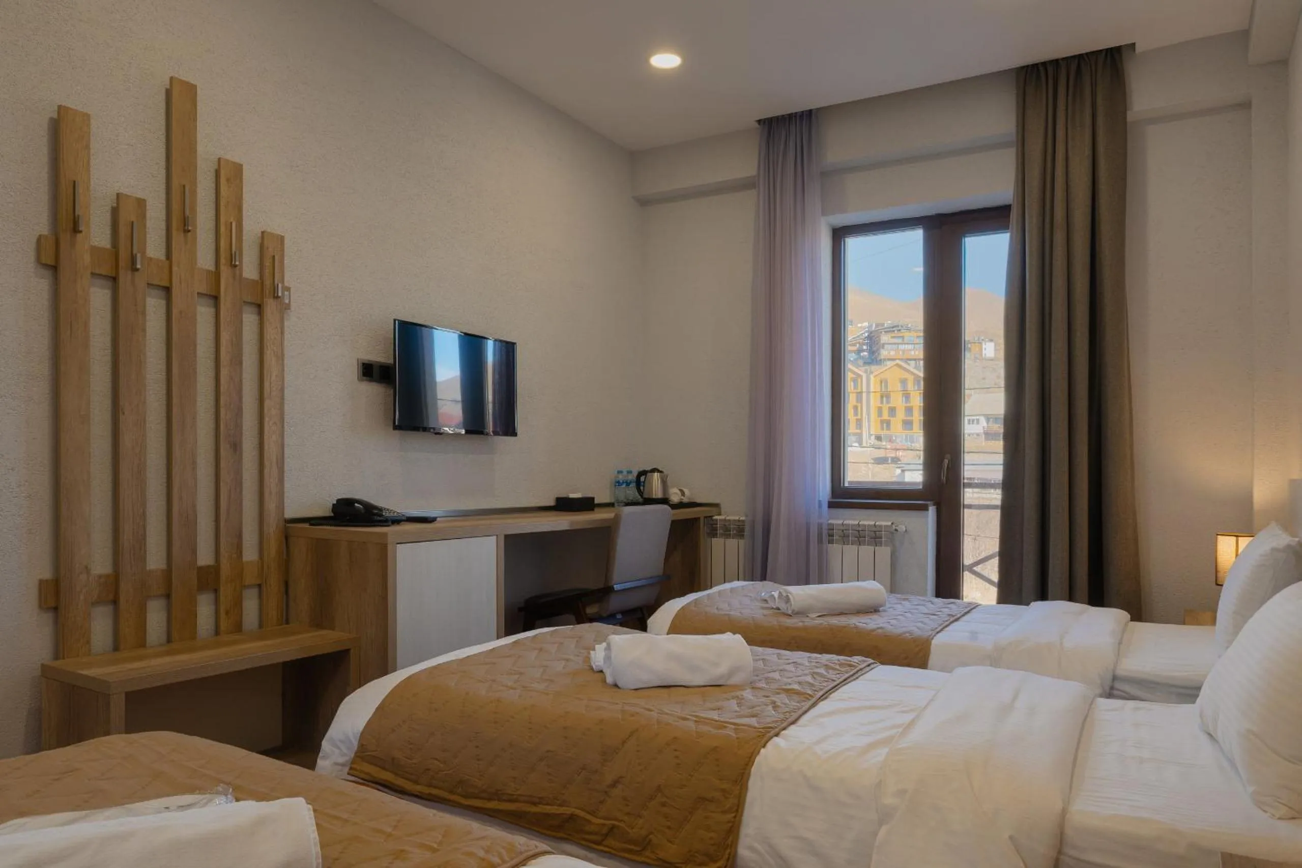 Bed in Ereto Hotel by SnowTime