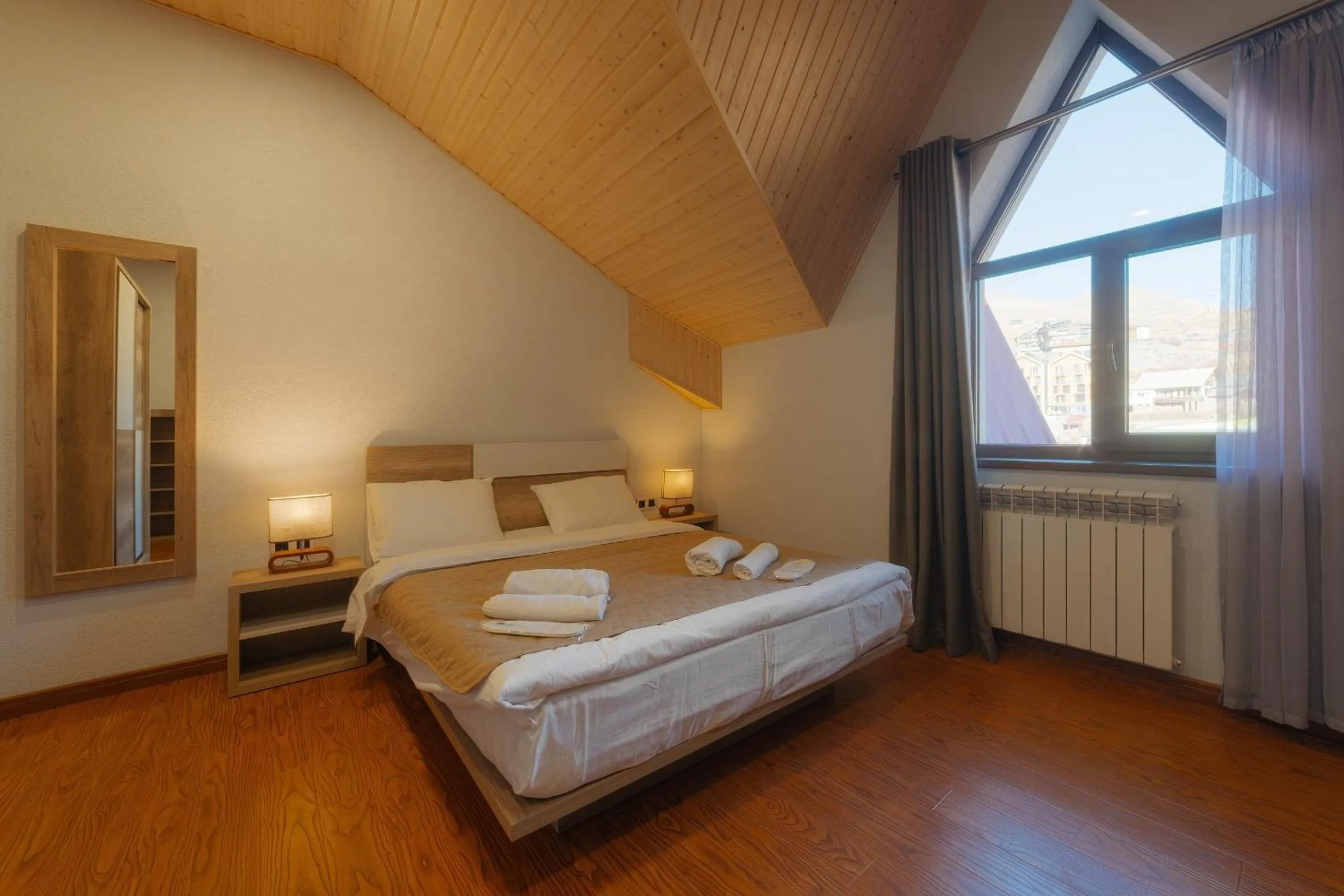 Bed in Ereto Hotel by SnowTime