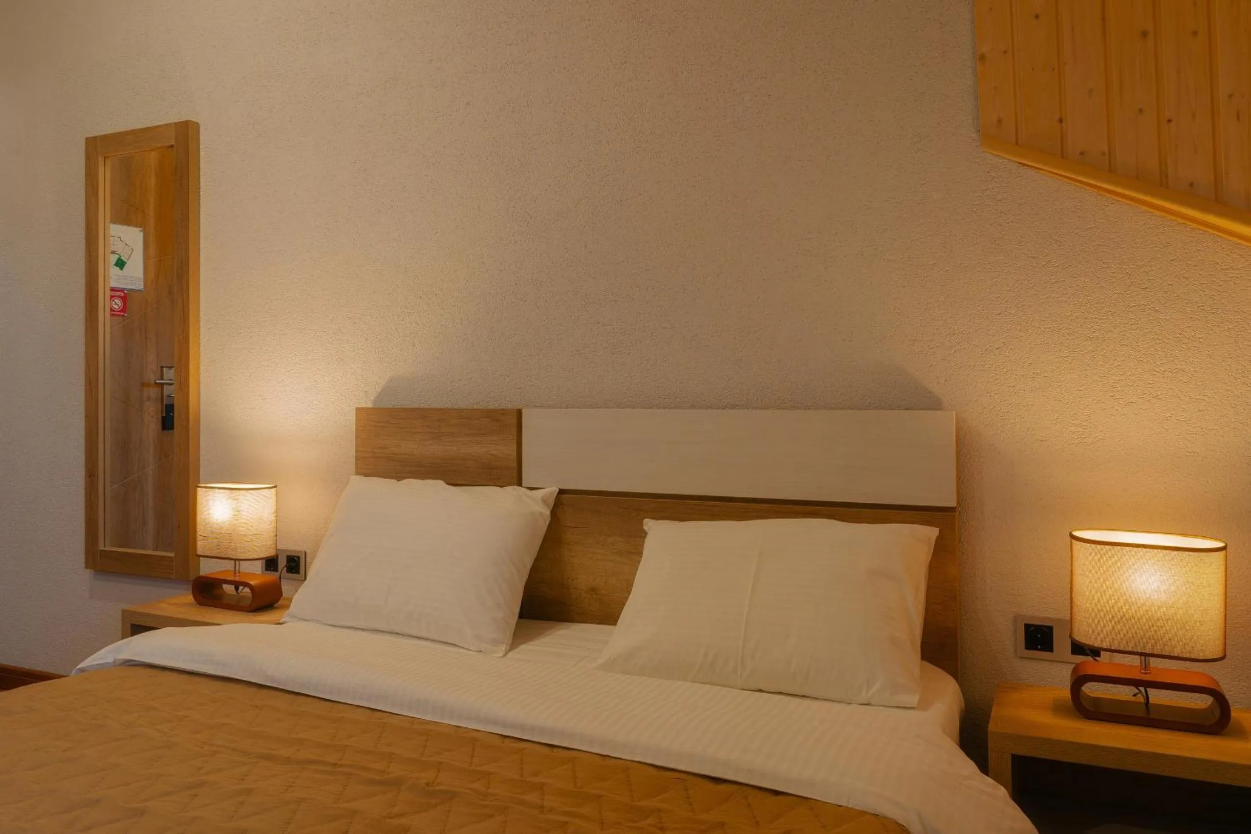 Bed in Ereto Hotel by SnowTime