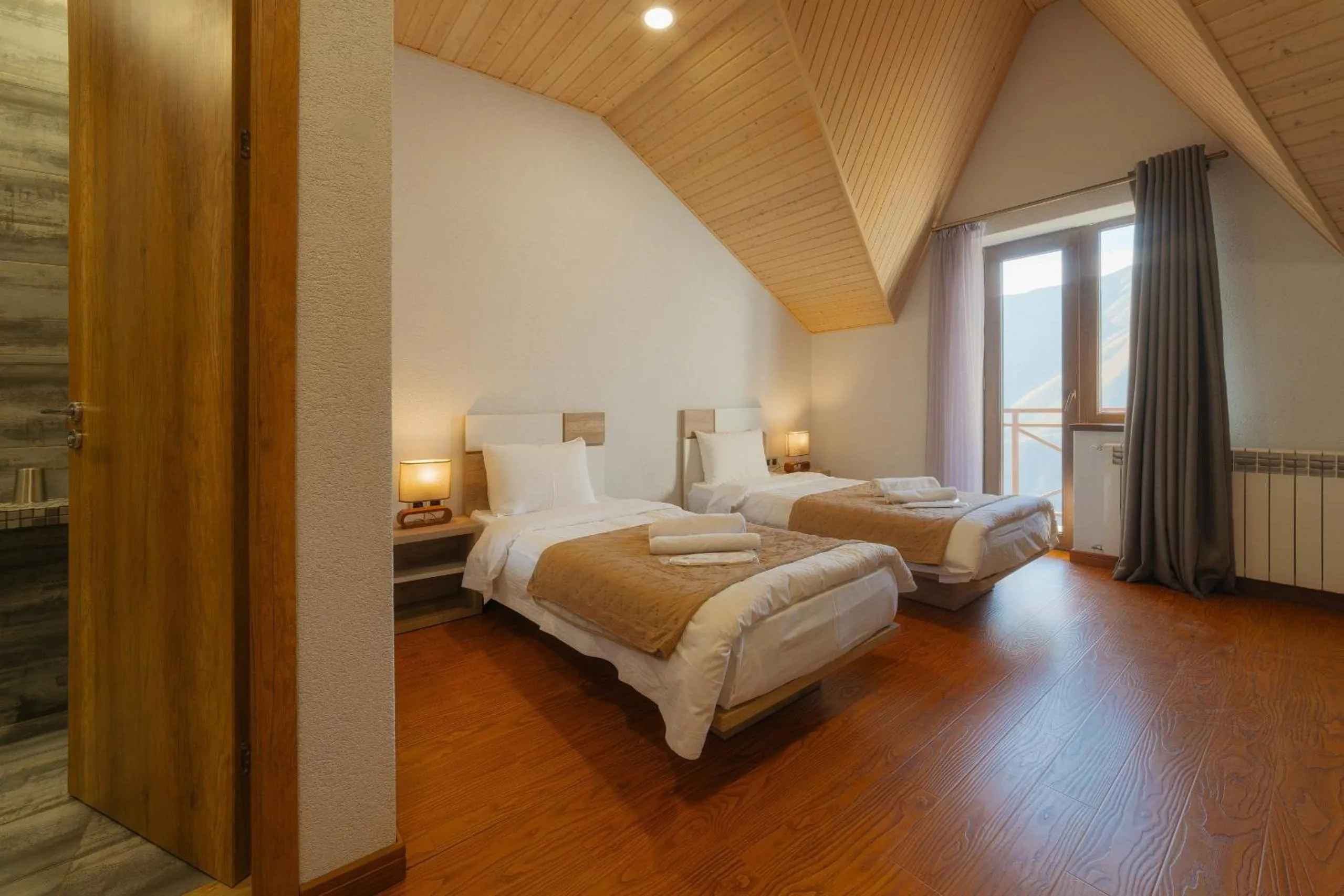 Bed in Ereto Hotel by SnowTime