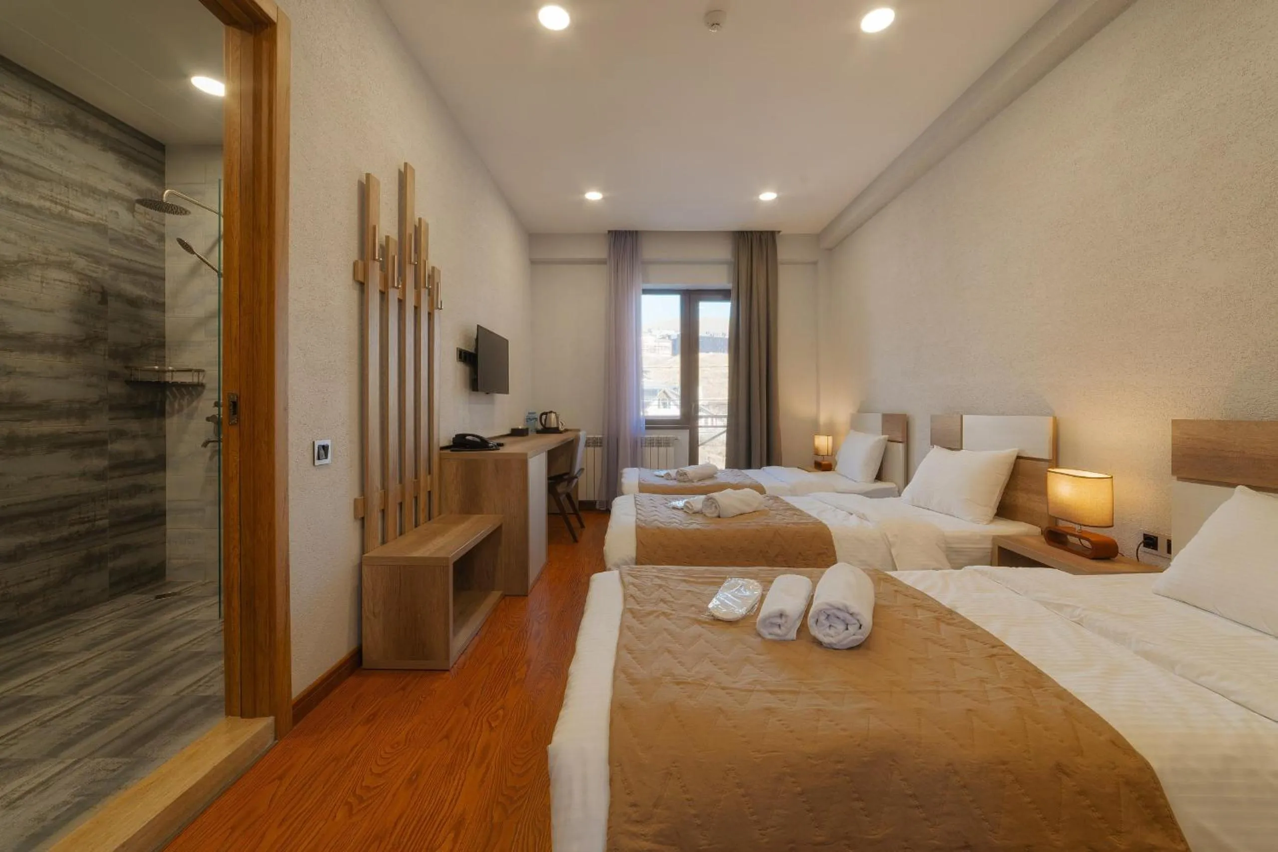 Bed in Ereto Hotel by SnowTime