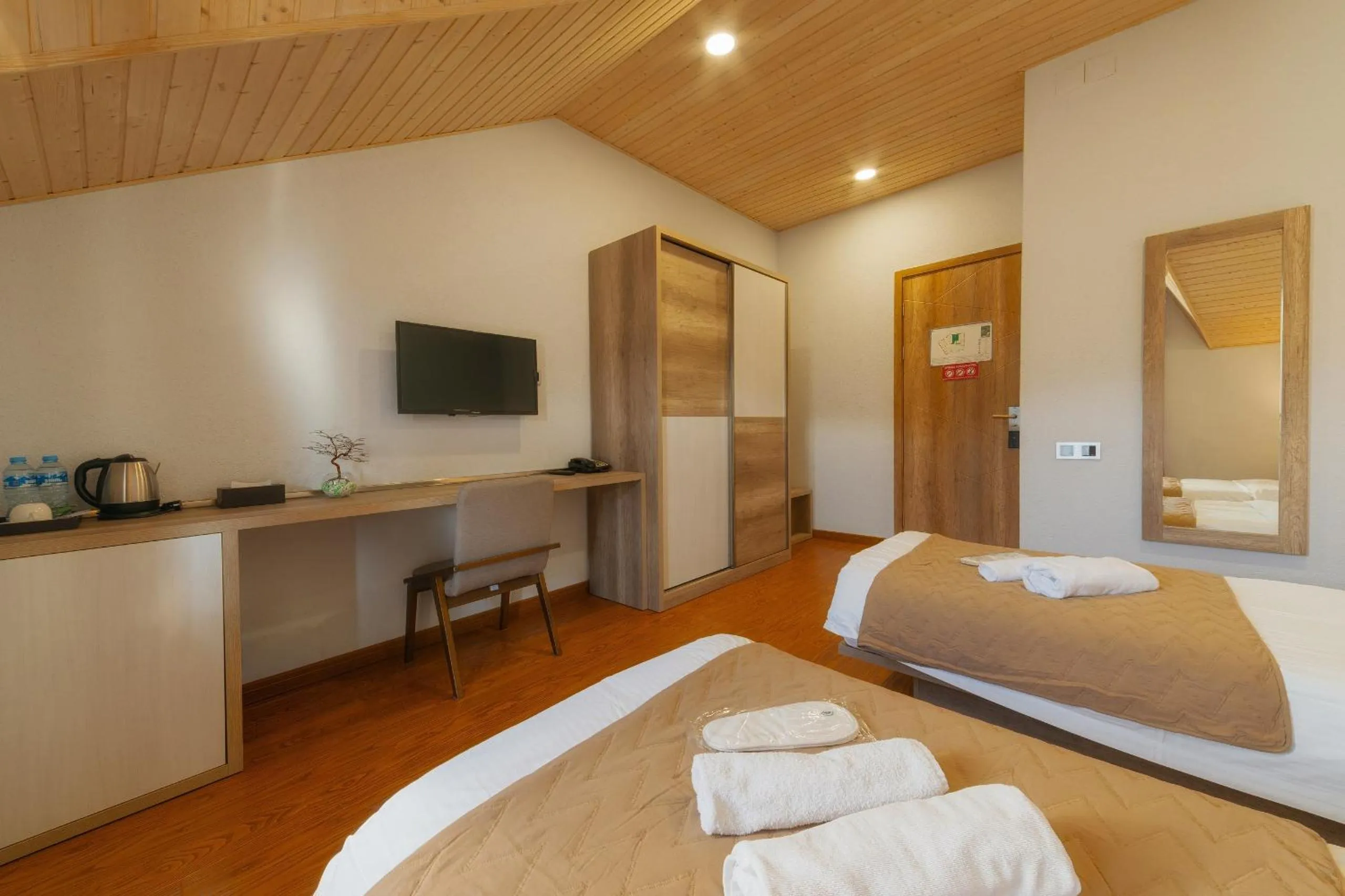 Bed in Ereto Hotel by SnowTime