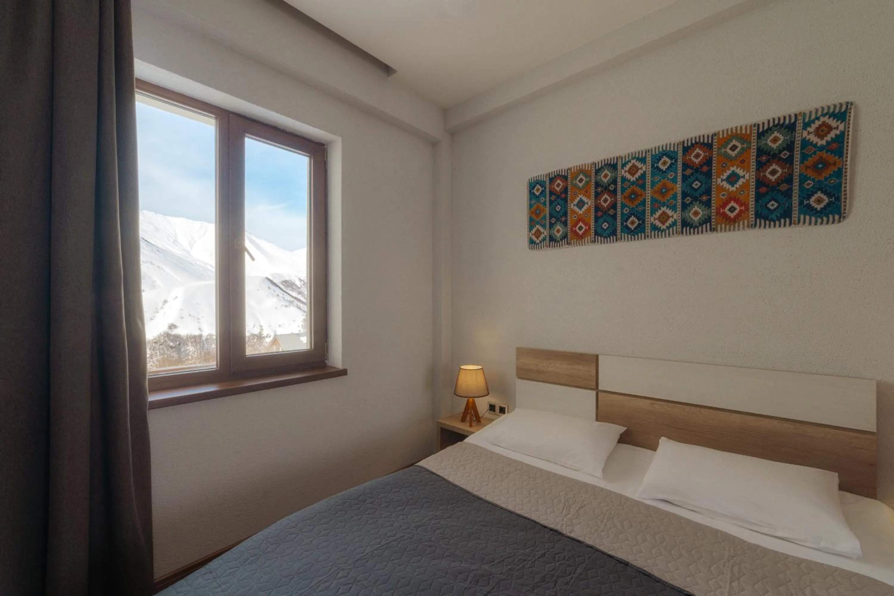 Bed in Ereto Hotel by SnowTime