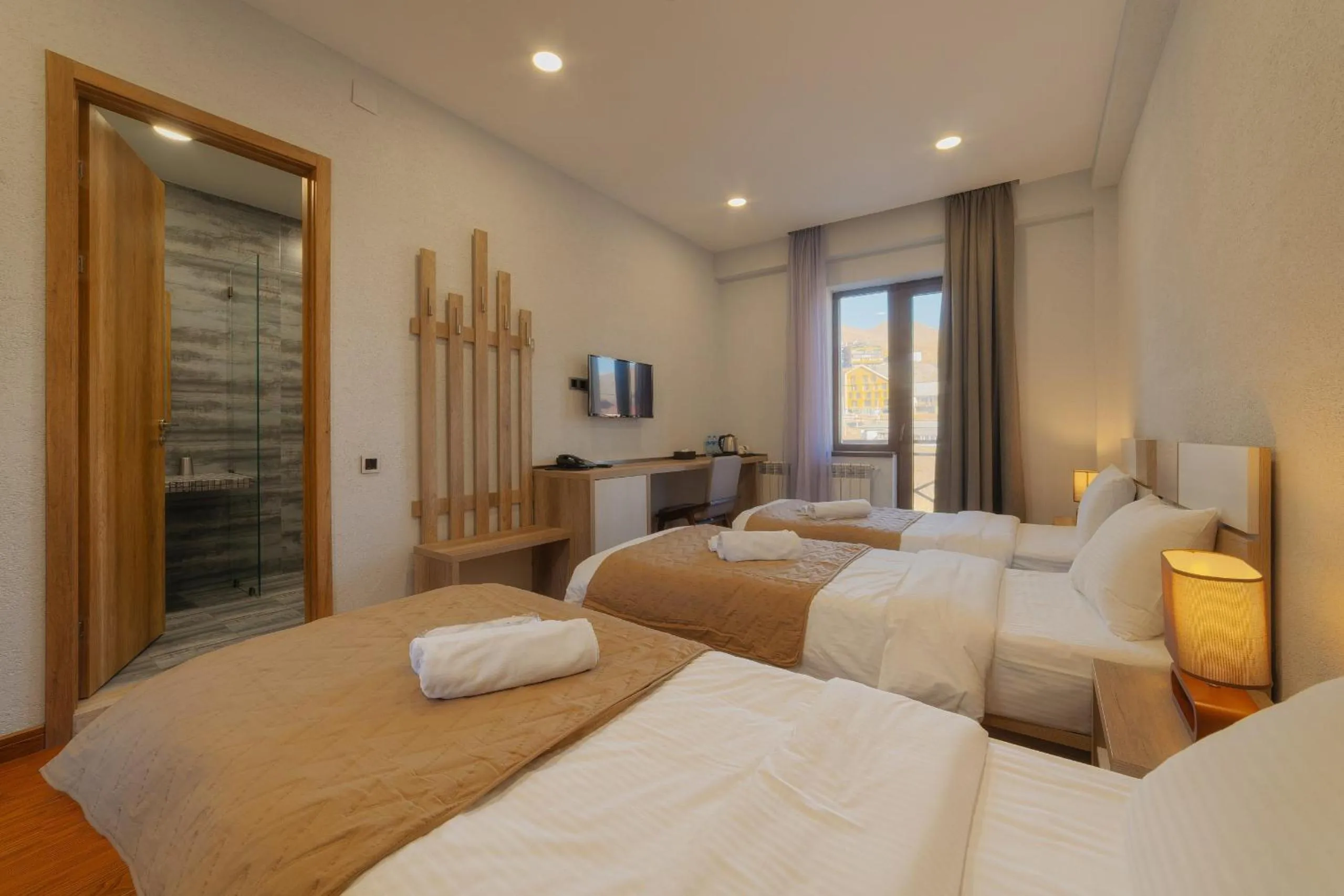 Bed in Ereto Hotel by SnowTime