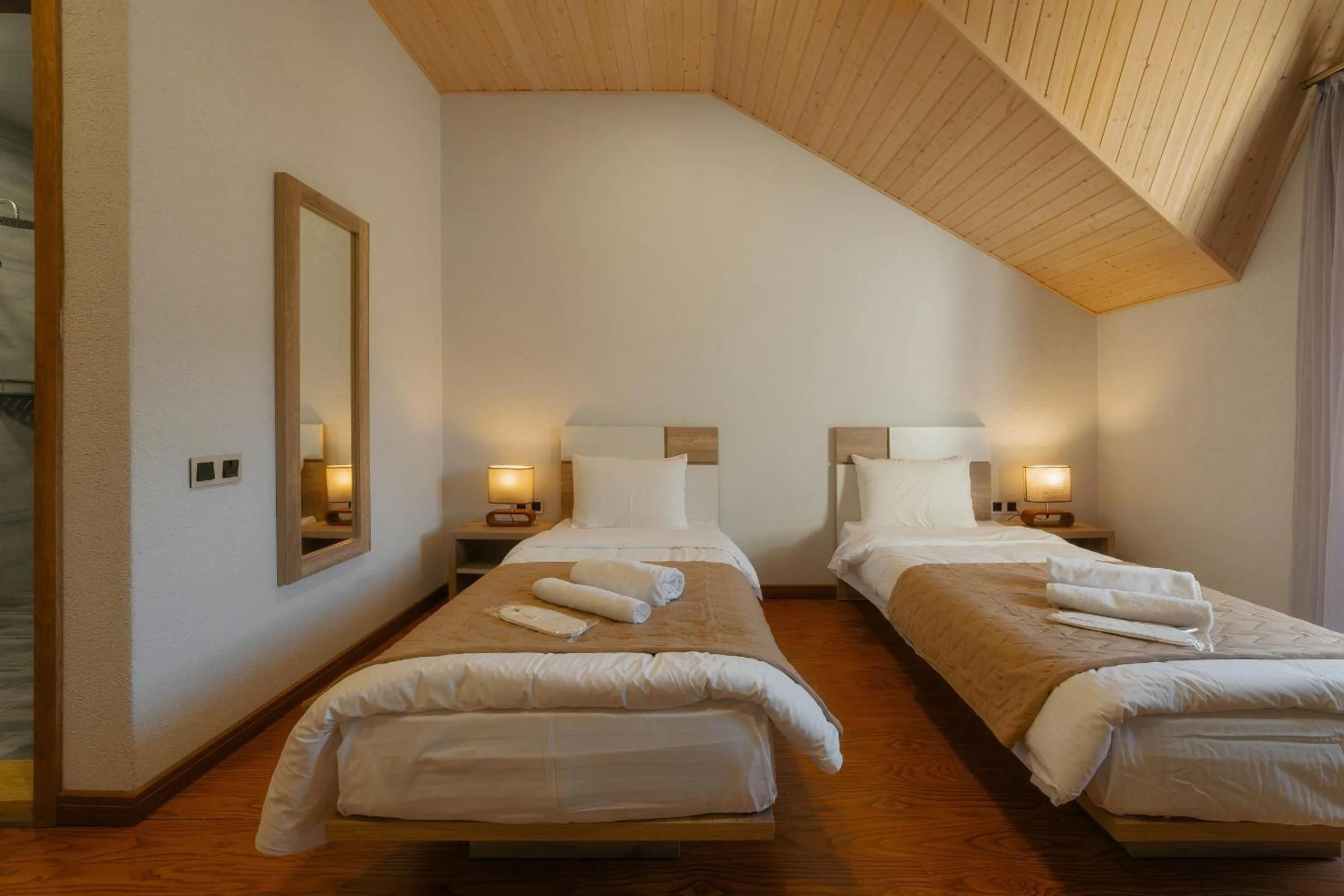 Bed in Ereto Hotel by SnowTime