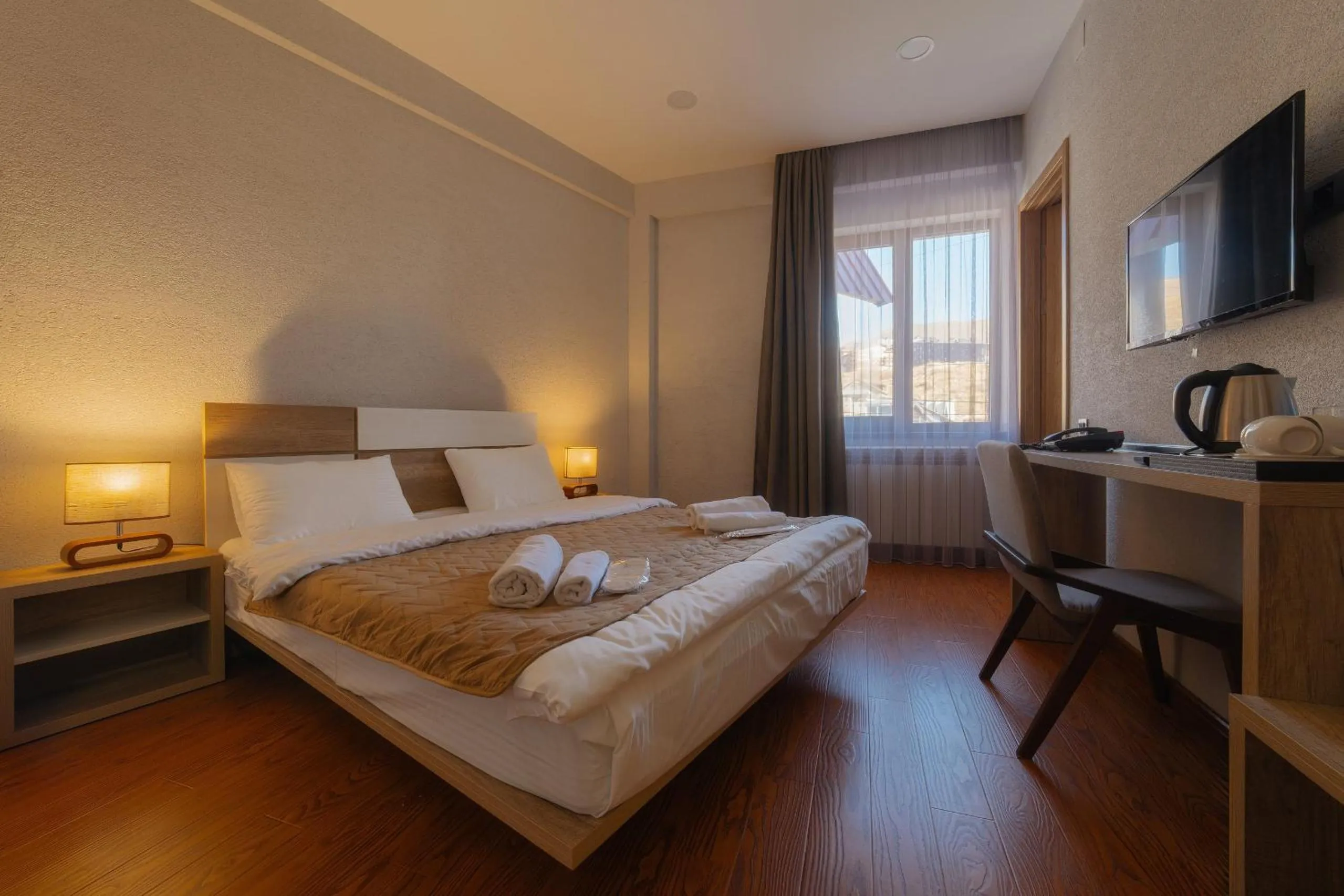 Bed in Ereto Hotel by SnowTime