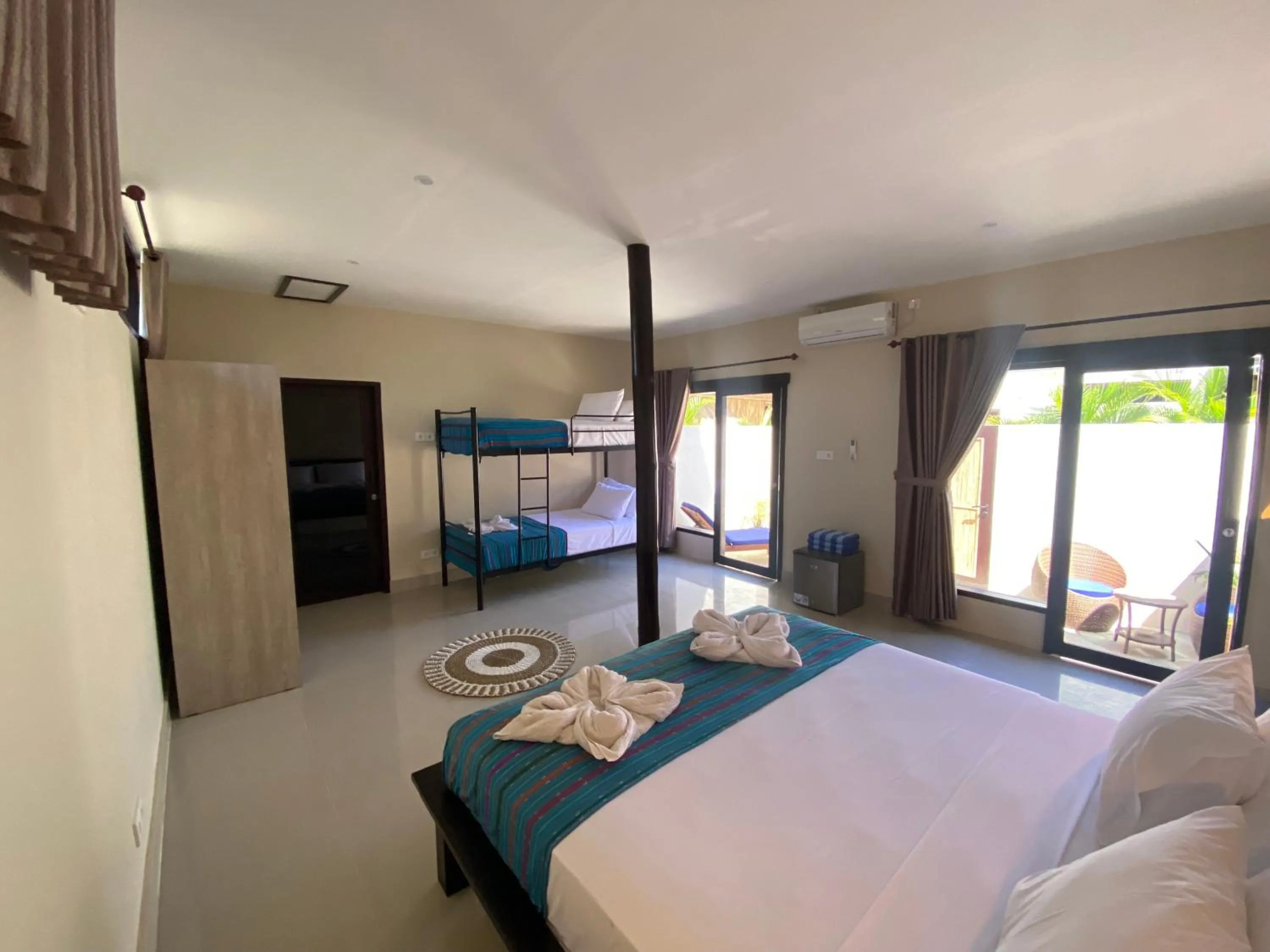 Bed in Ekas Surf Resort & Surf Camp