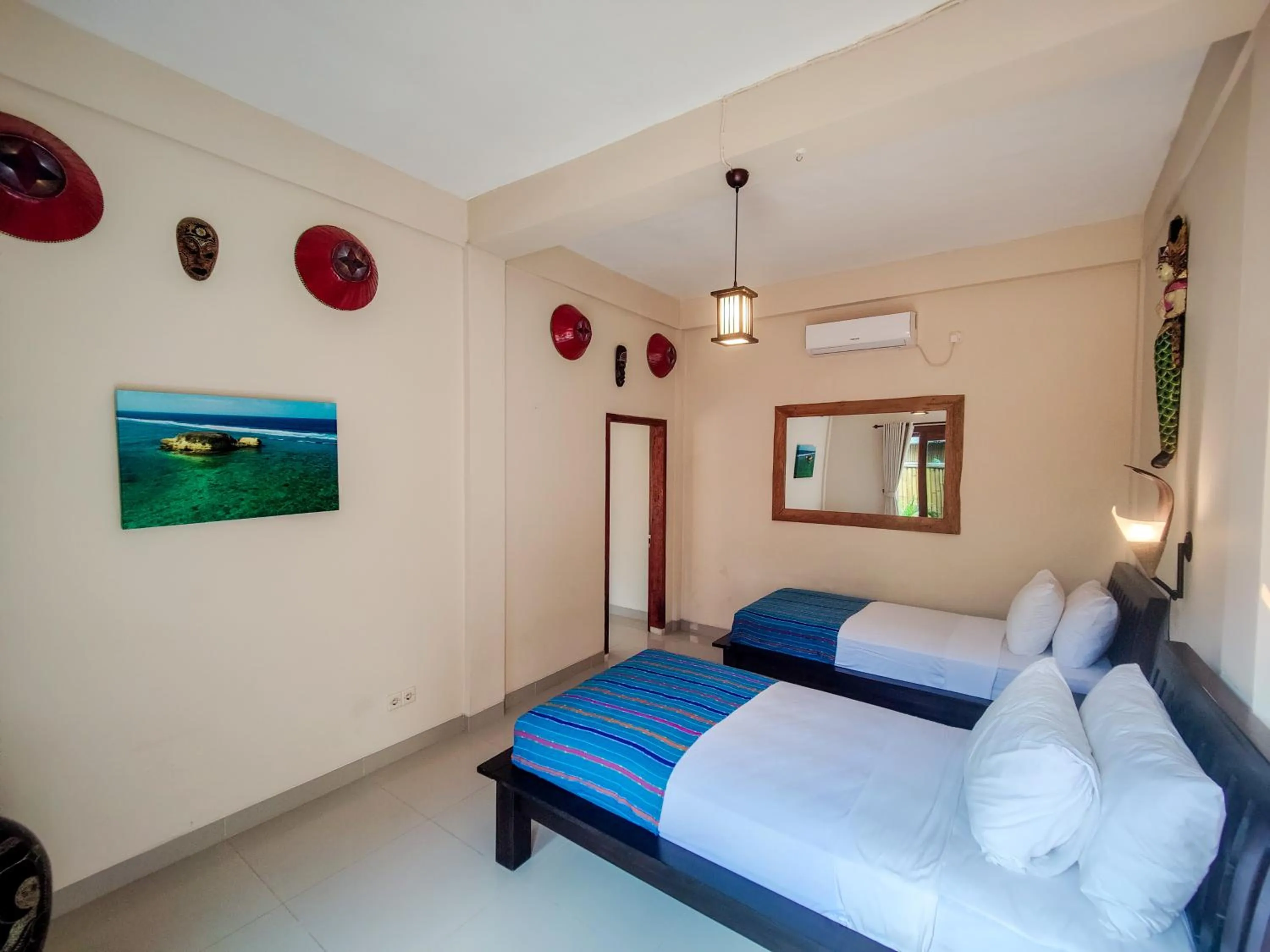 Bed in Ekas Surf Resort & Surf Camp