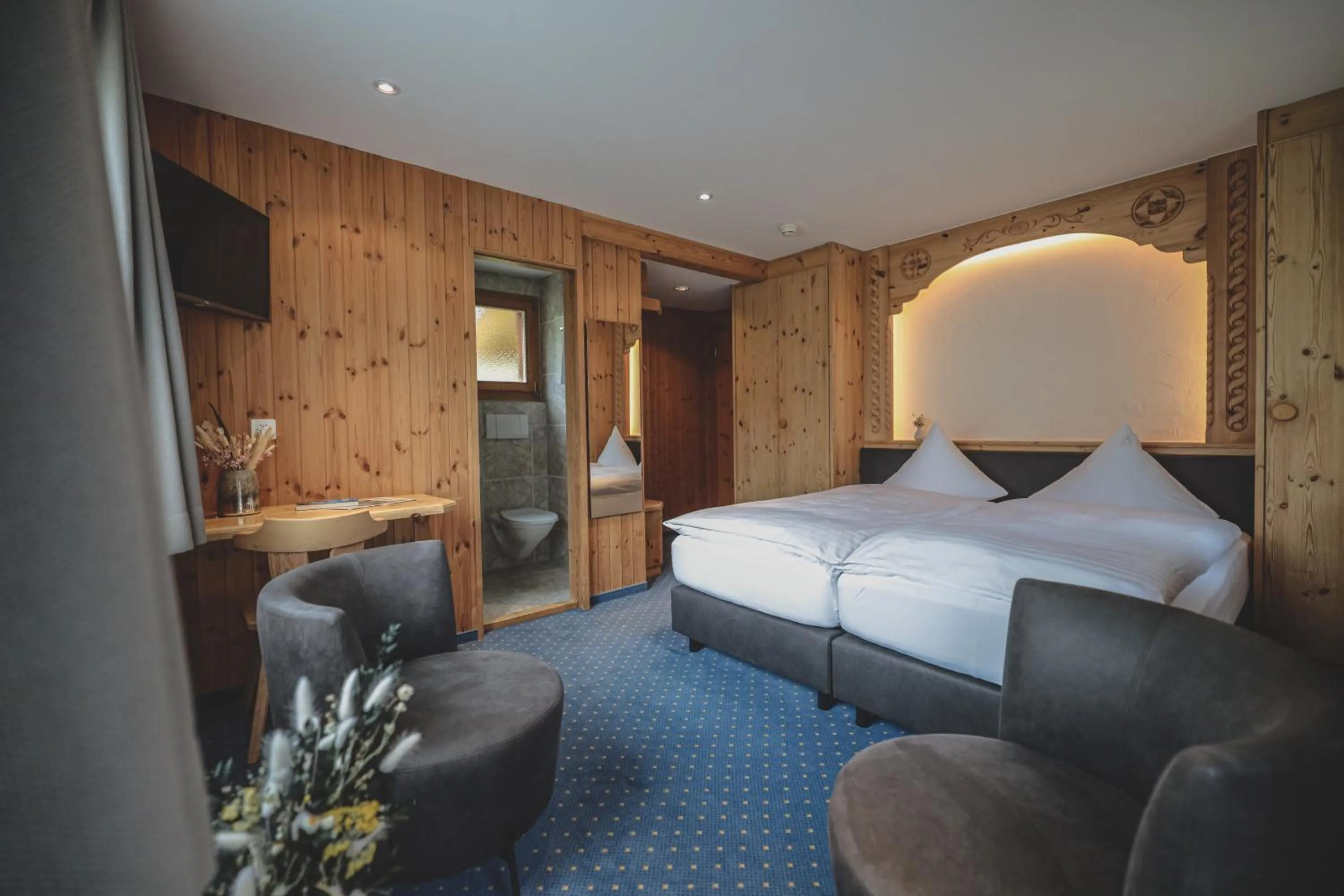 Bed in Hotel Sonnenhalde, Arosa