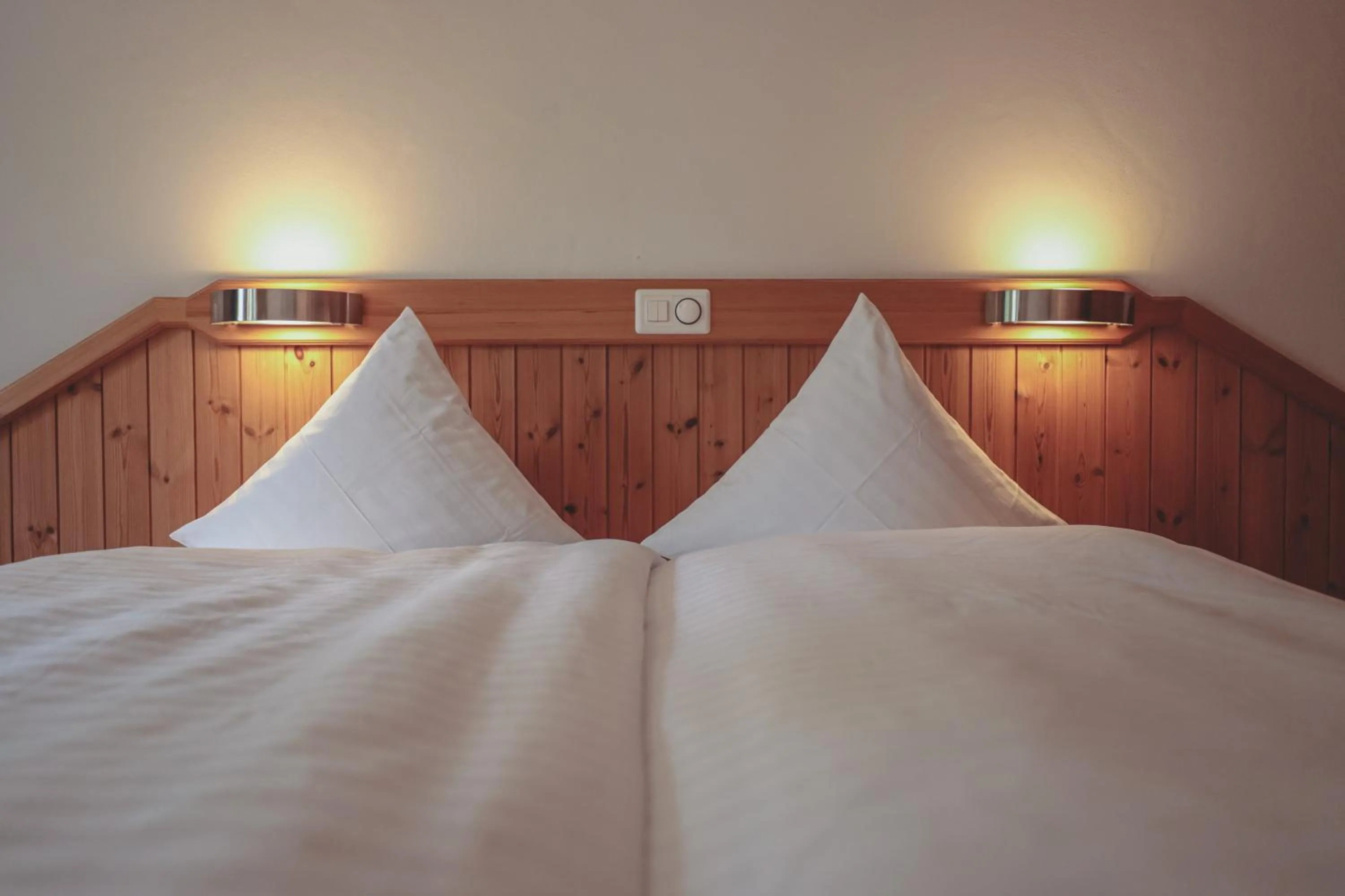 Bed in Hotel Sonnenhalde, Arosa