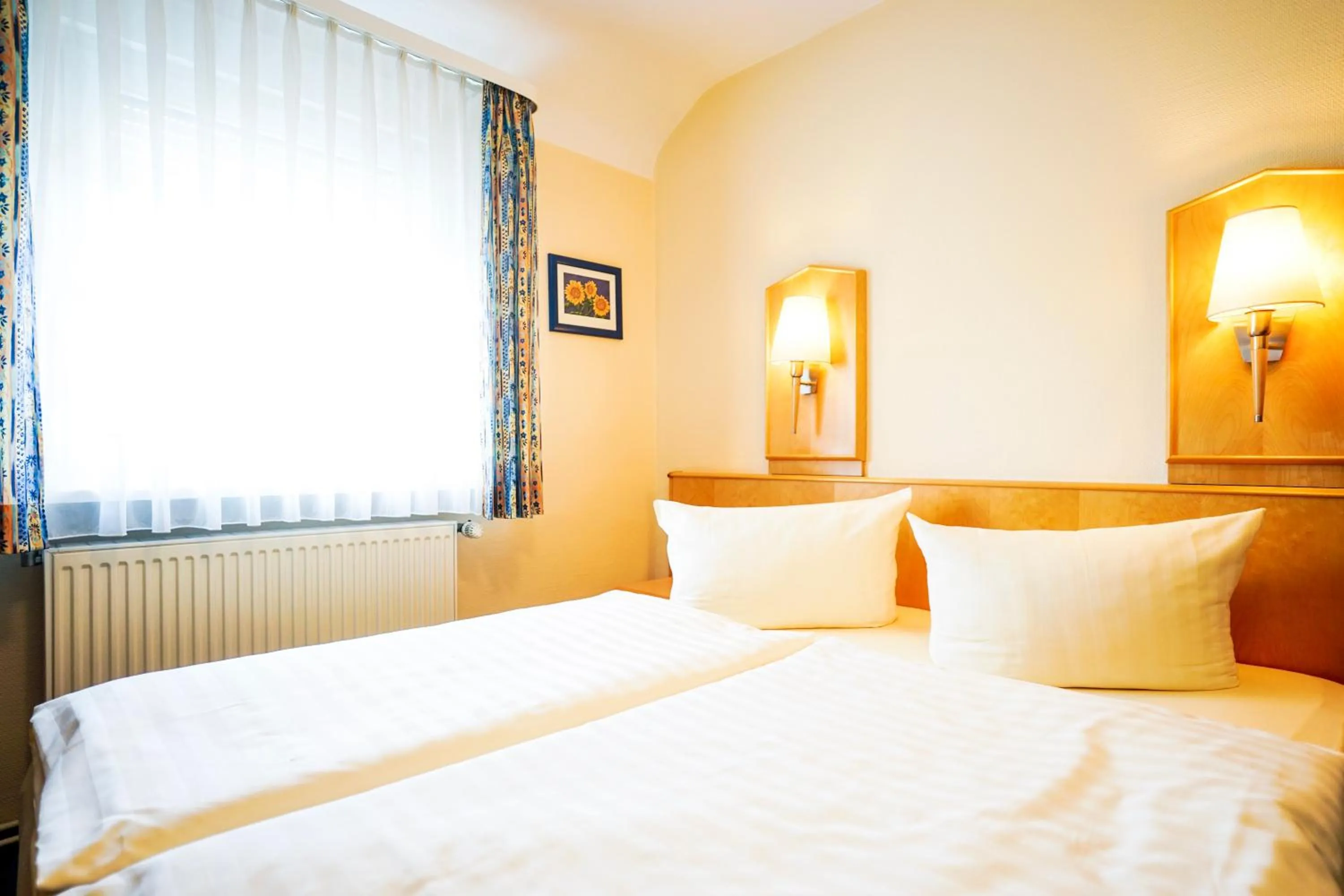 Bed in Hotel Sauer Garni