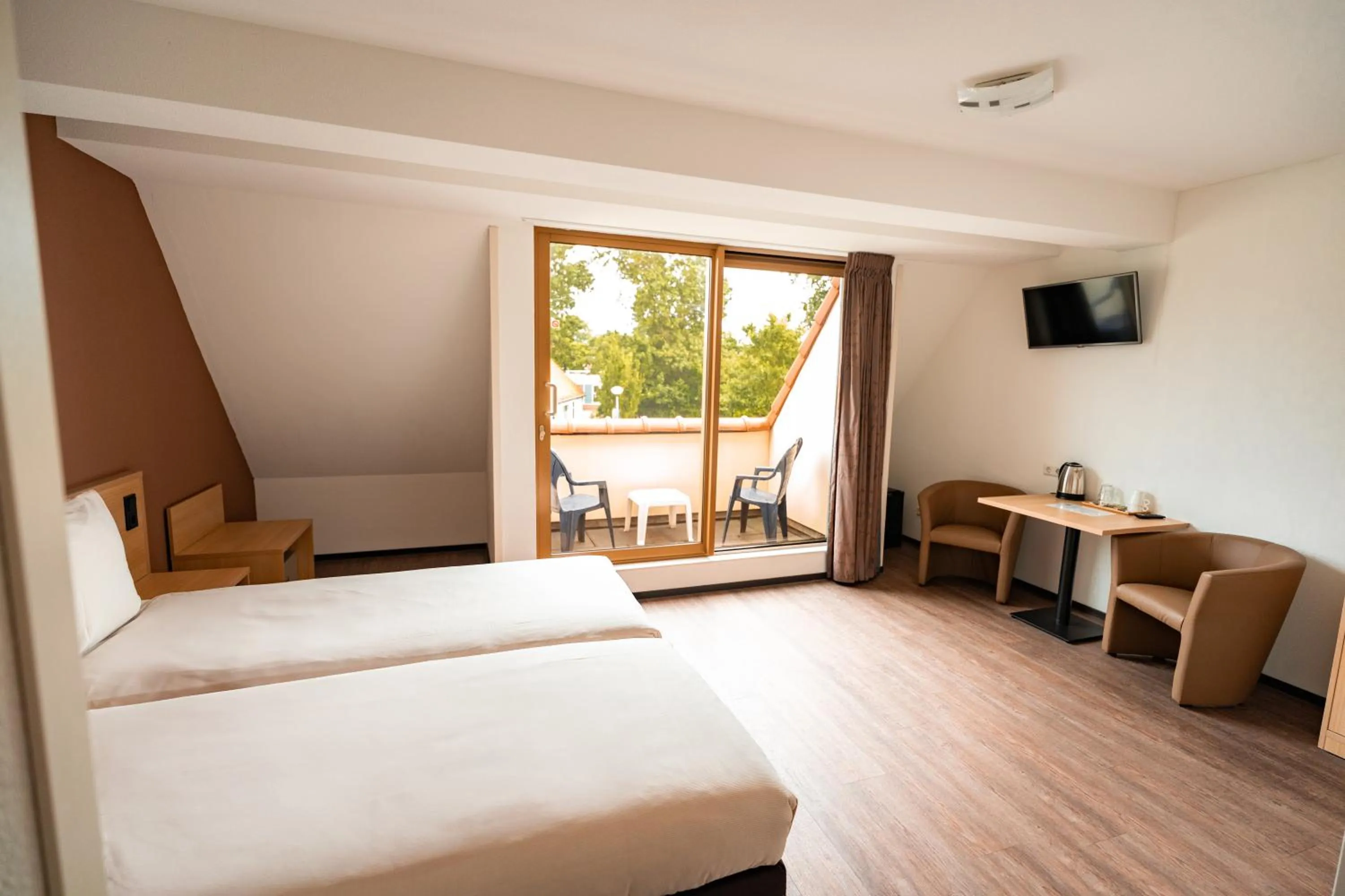 Photo of the whole room, Bed in Hotel het Zwaantje