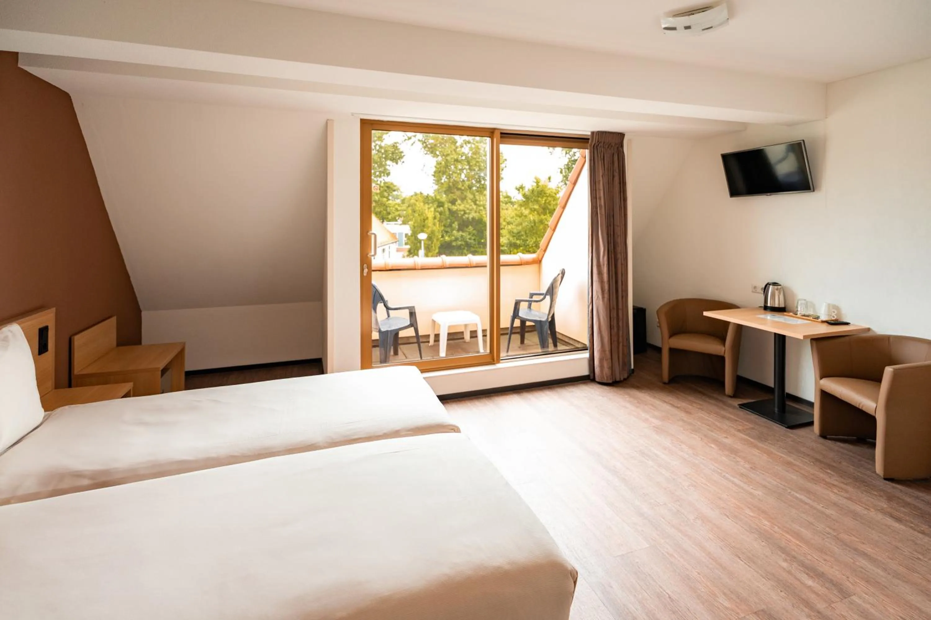 Photo of the whole room, Bed in Hotel het Zwaantje