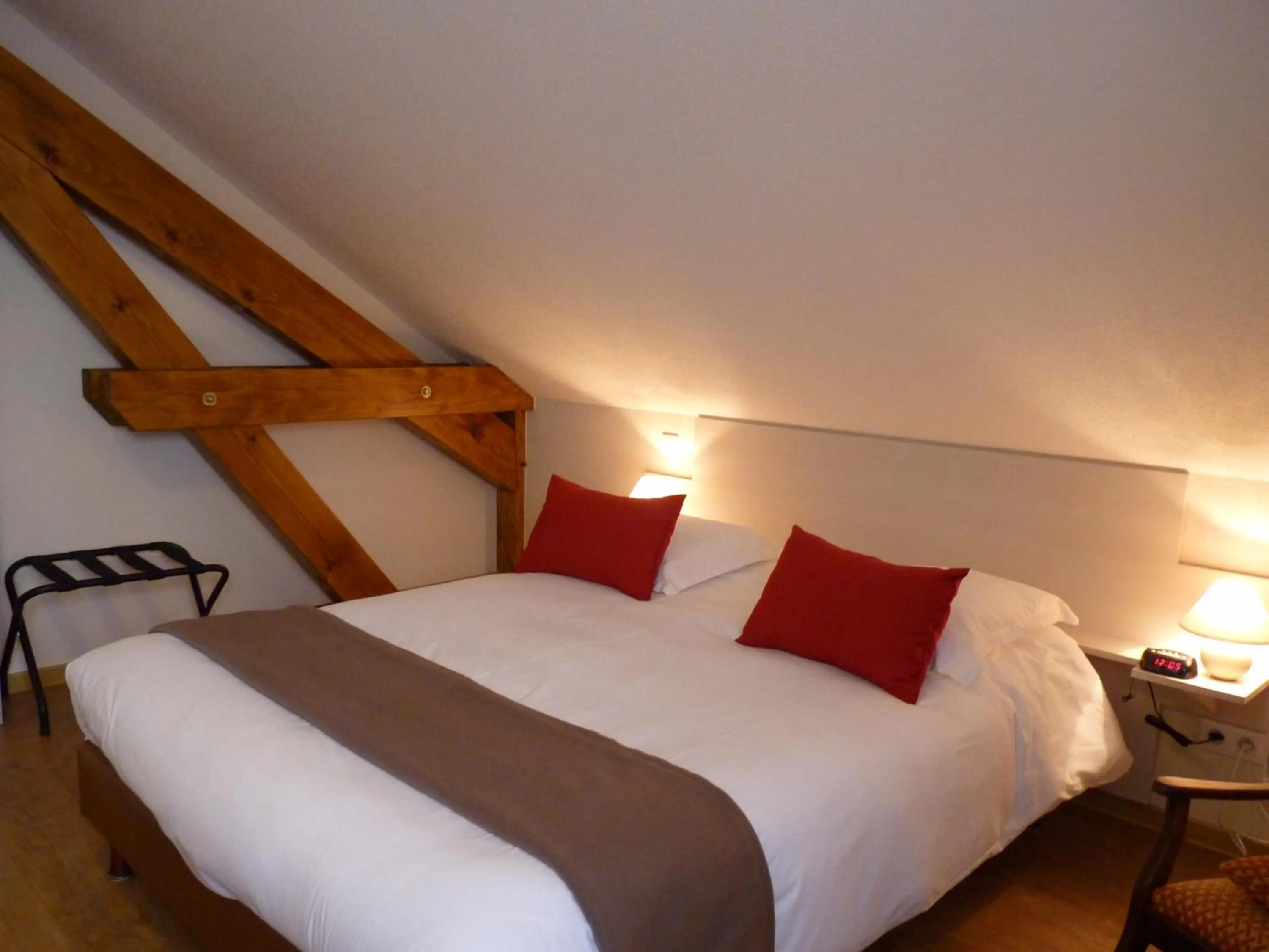 Photo of the whole room, Bed in Logis Hôtel Notre-Dame - restaurant ouvert midi et soir sauf dimanche soir