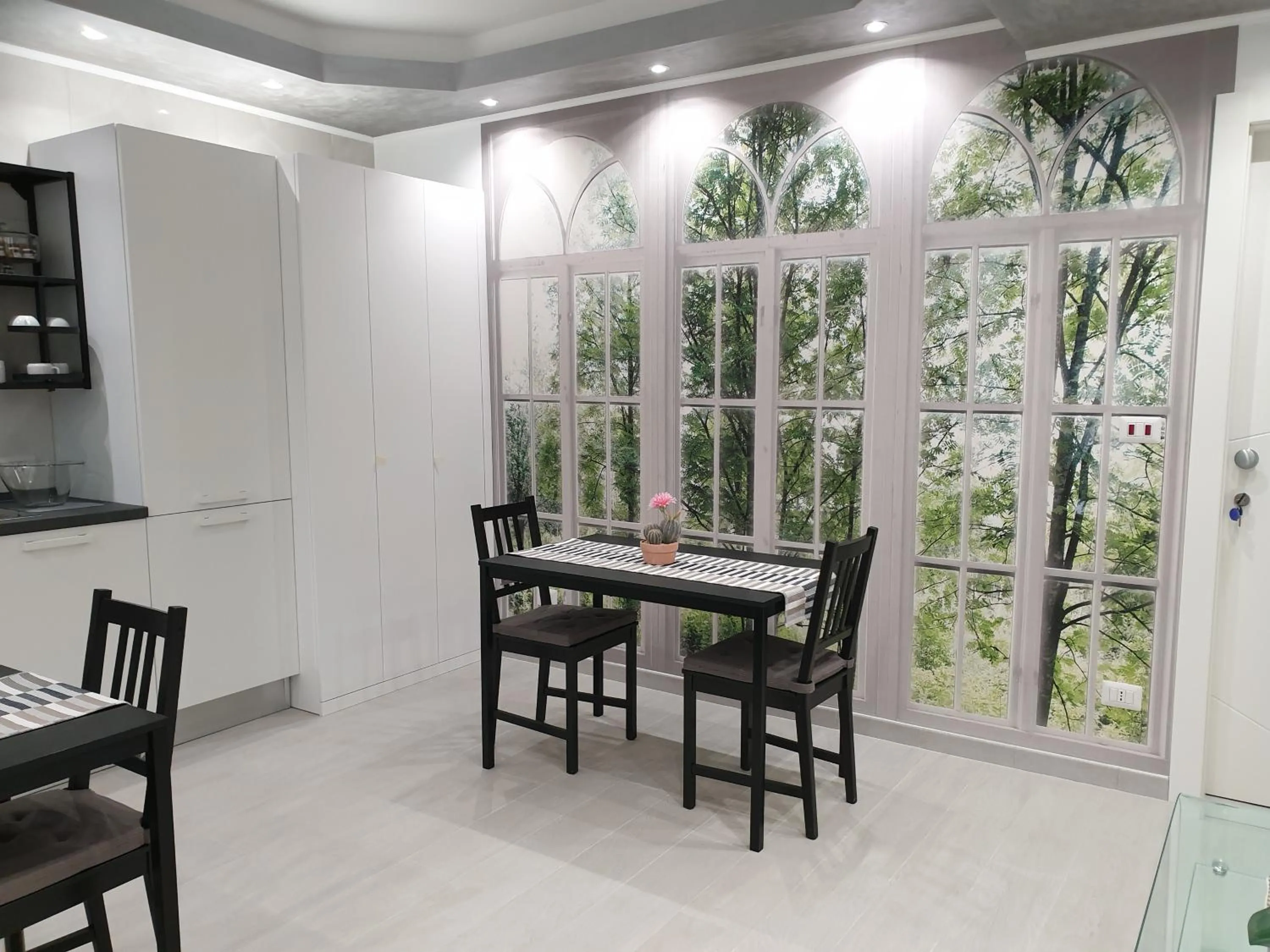 Communal lounge/ TV room in Olympic Suite Roma