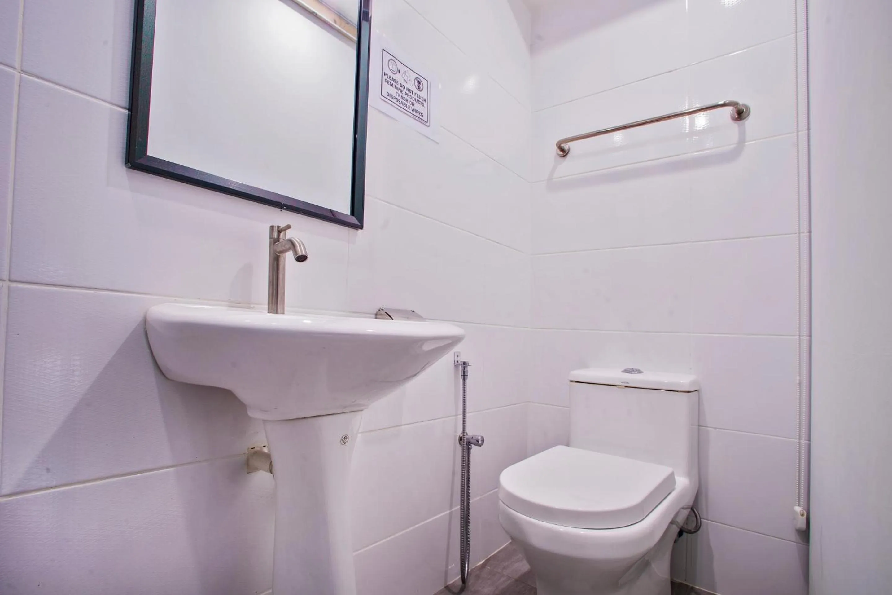 Bathroom in Hotel O Gs Hotels Near Strand Mall