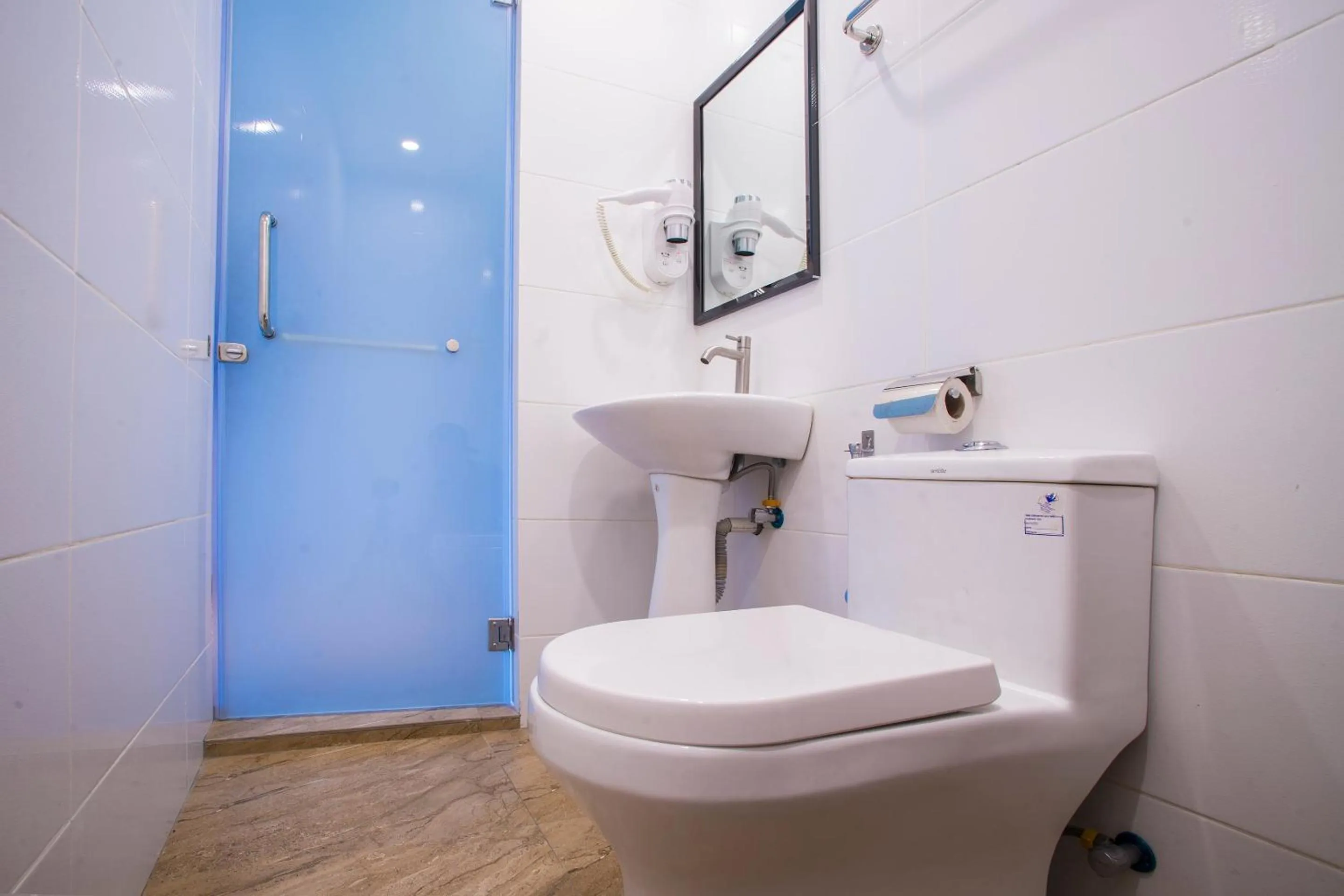 Bedroom in Hotel O Gs Hotels Near Strand Mall