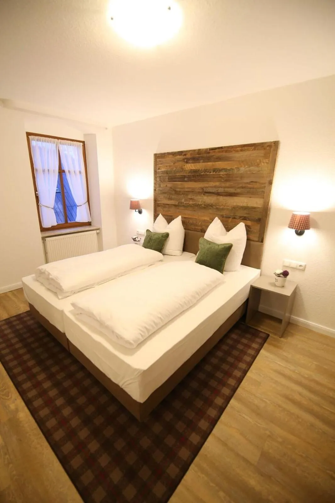 Bed in Aparthotel Deutscher Kaiser Ferienwohnungen