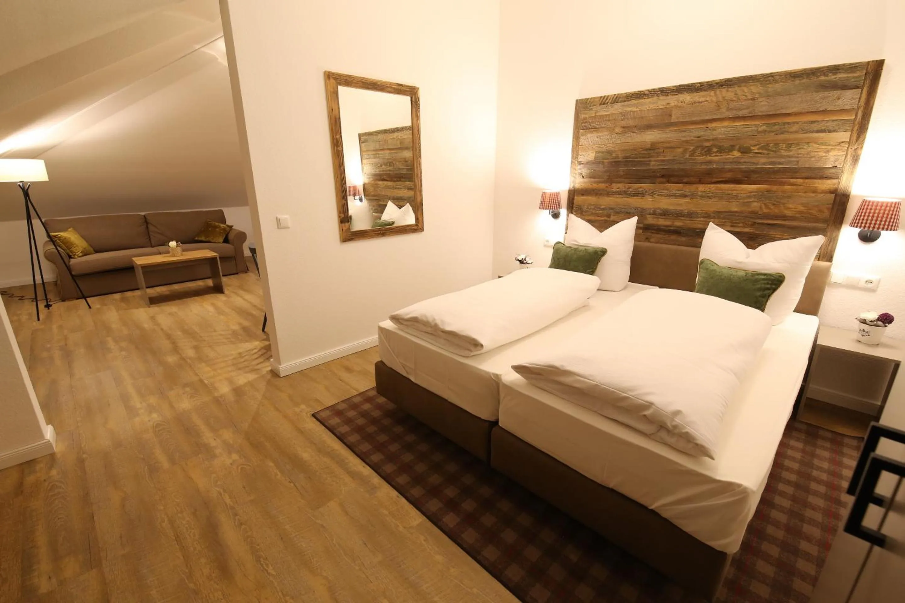 Bed in Aparthotel Deutscher Kaiser Ferienwohnungen
