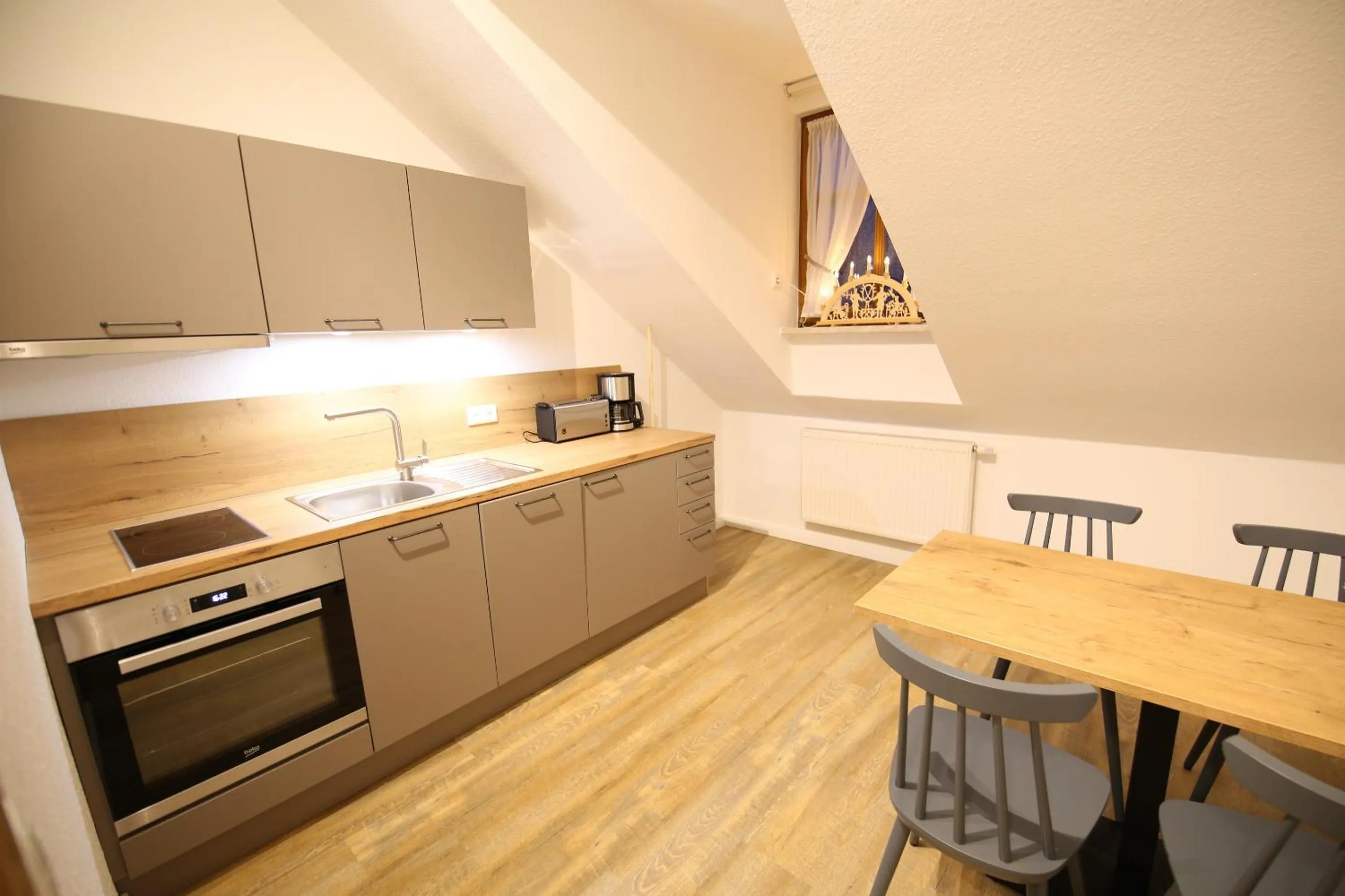 Kitchen or kitchenette in Aparthotel Deutscher Kaiser Ferienwohnungen