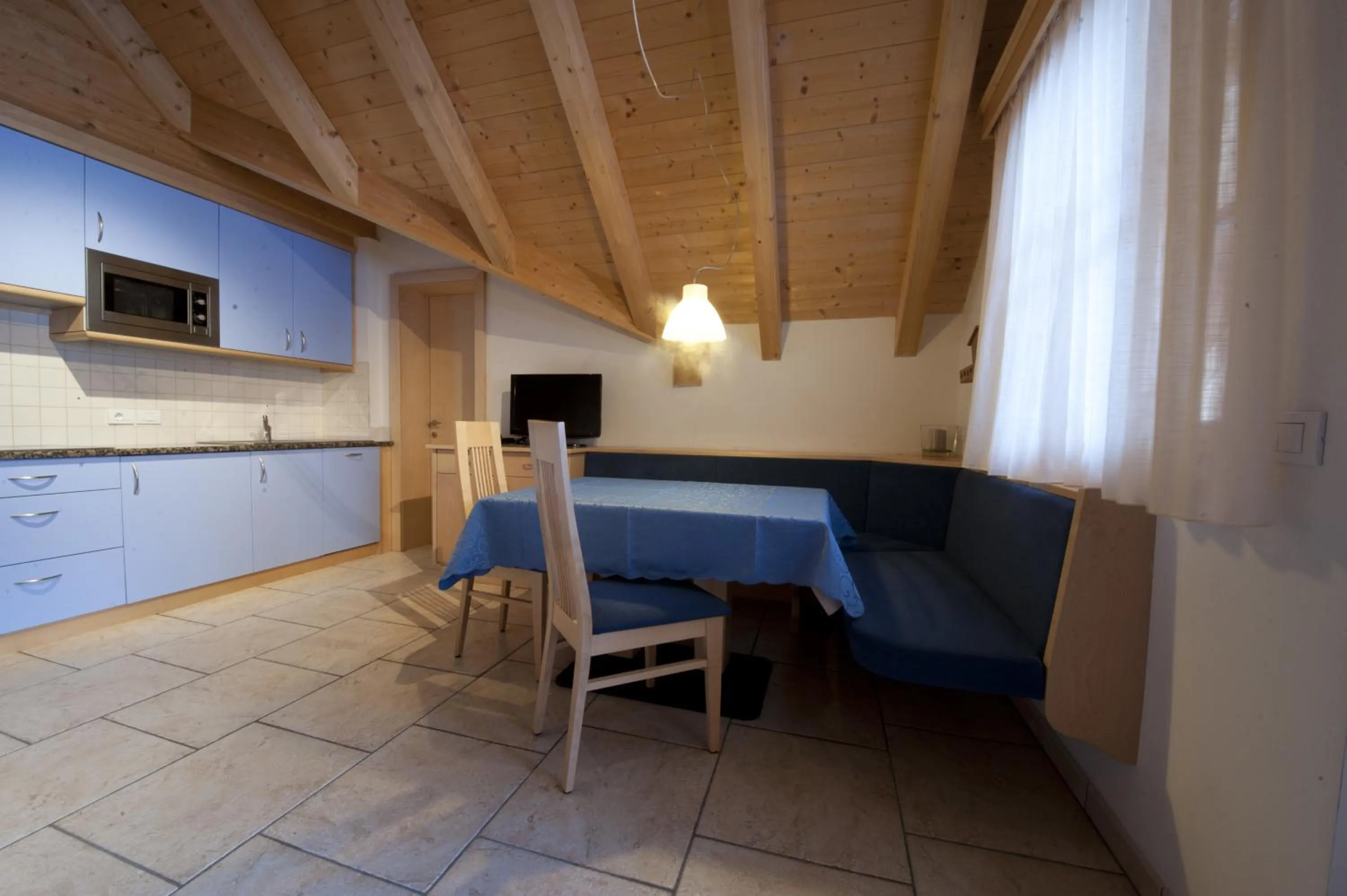 Kitchen or kitchenette in Appartamenti Villa Olympia