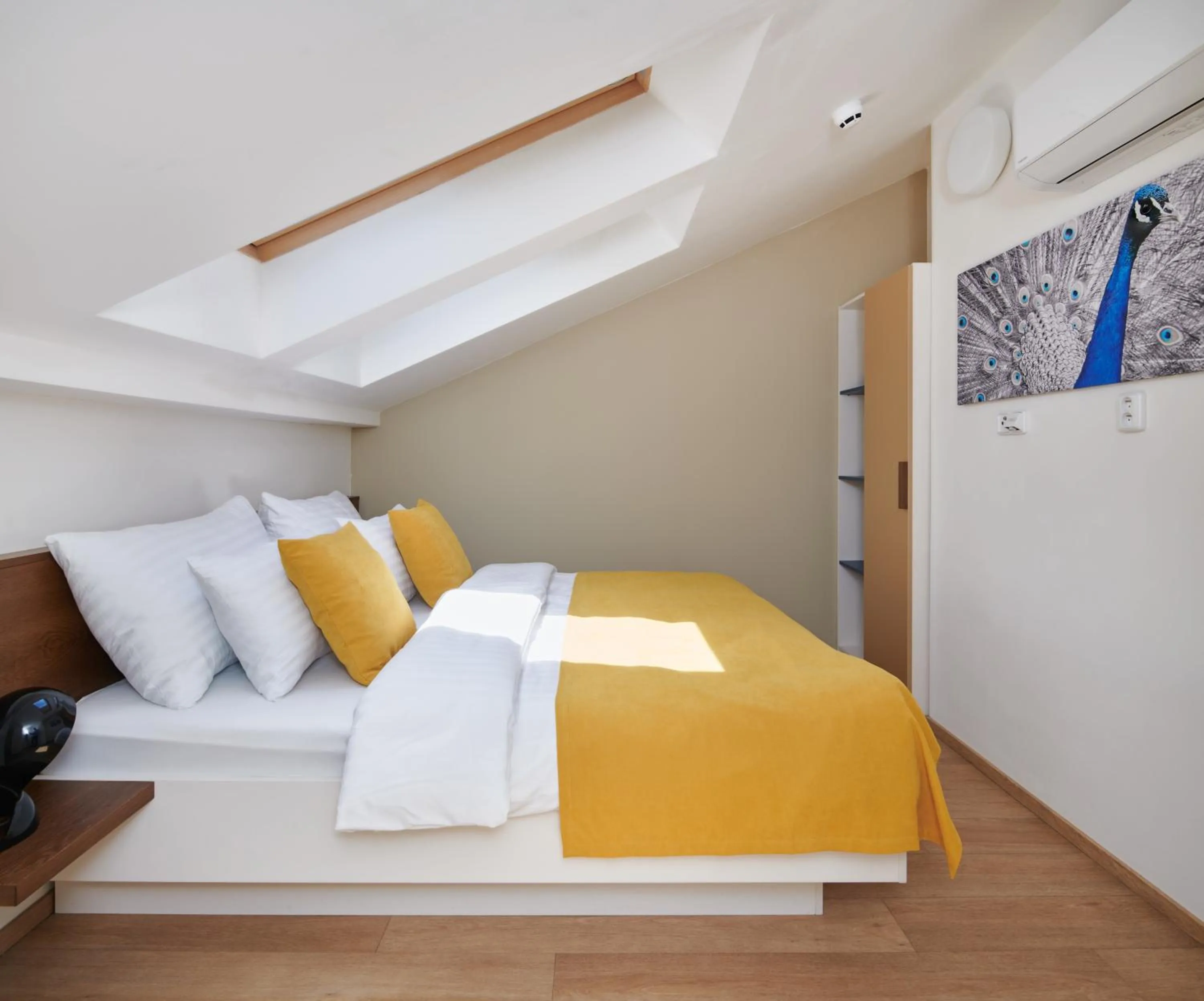 Bedroom, Bed in City Nest Apartments by Adrez