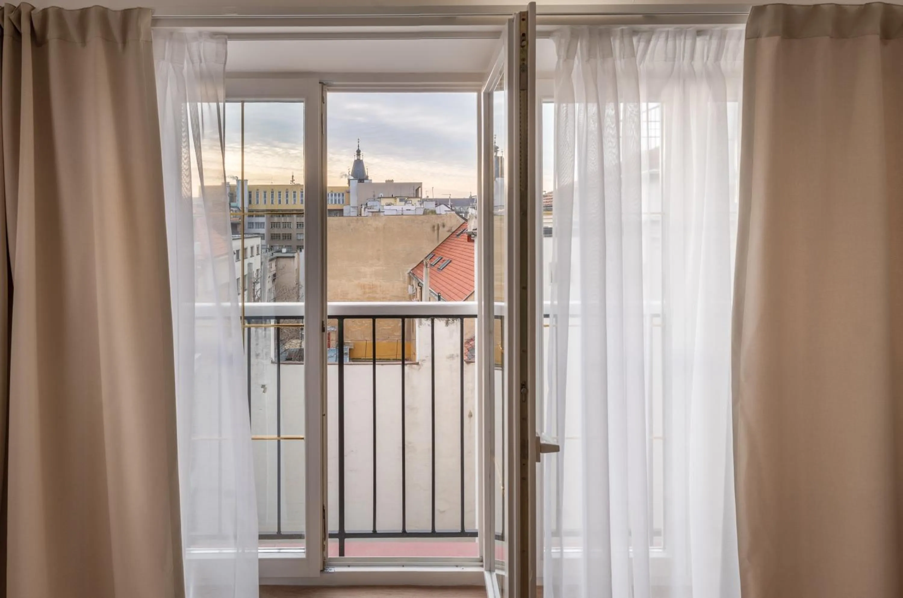 Living room in City Nest Apartments by Adrez