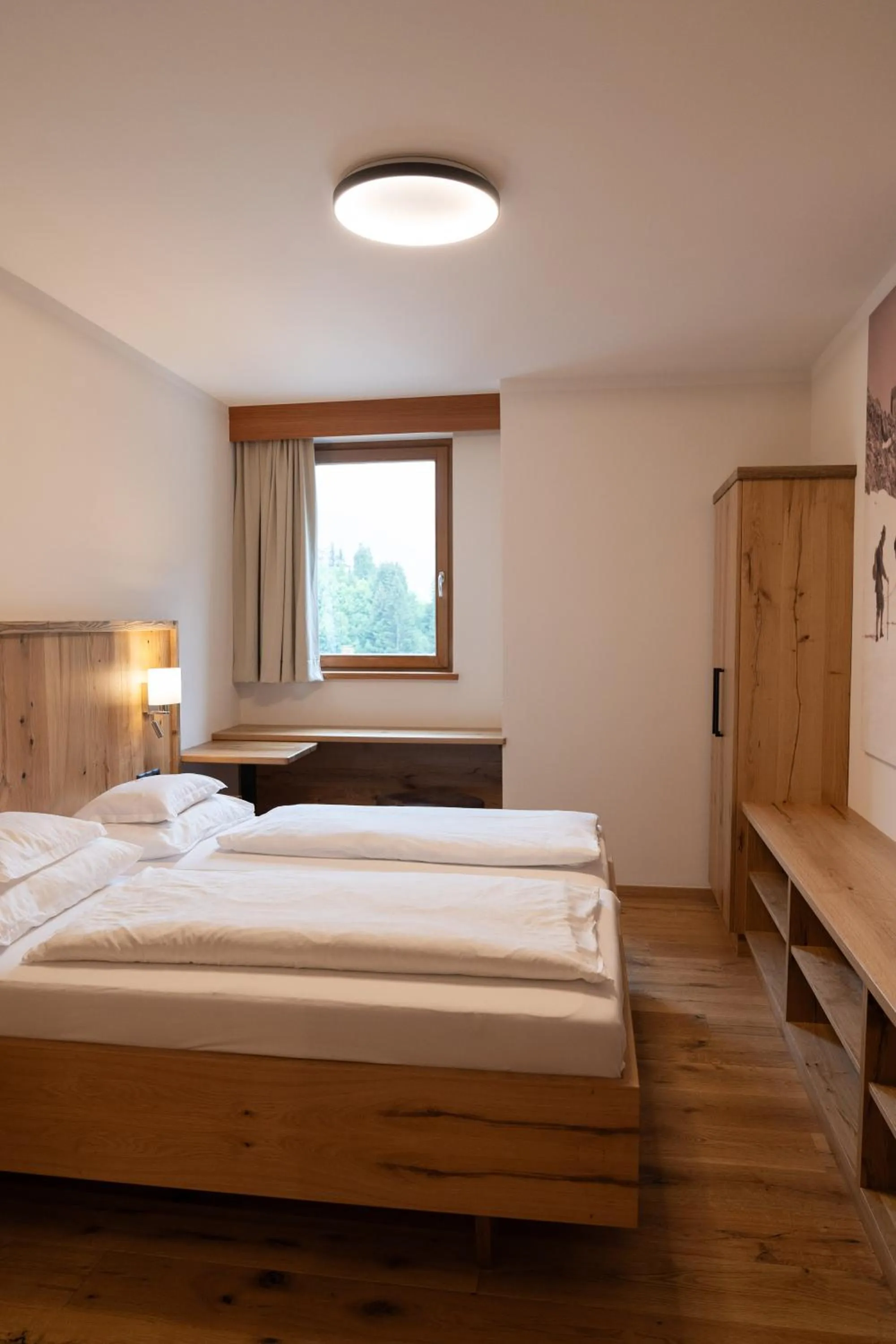 Photo of the whole room, Bed in Wellnesshotel Mein Almhof Superior