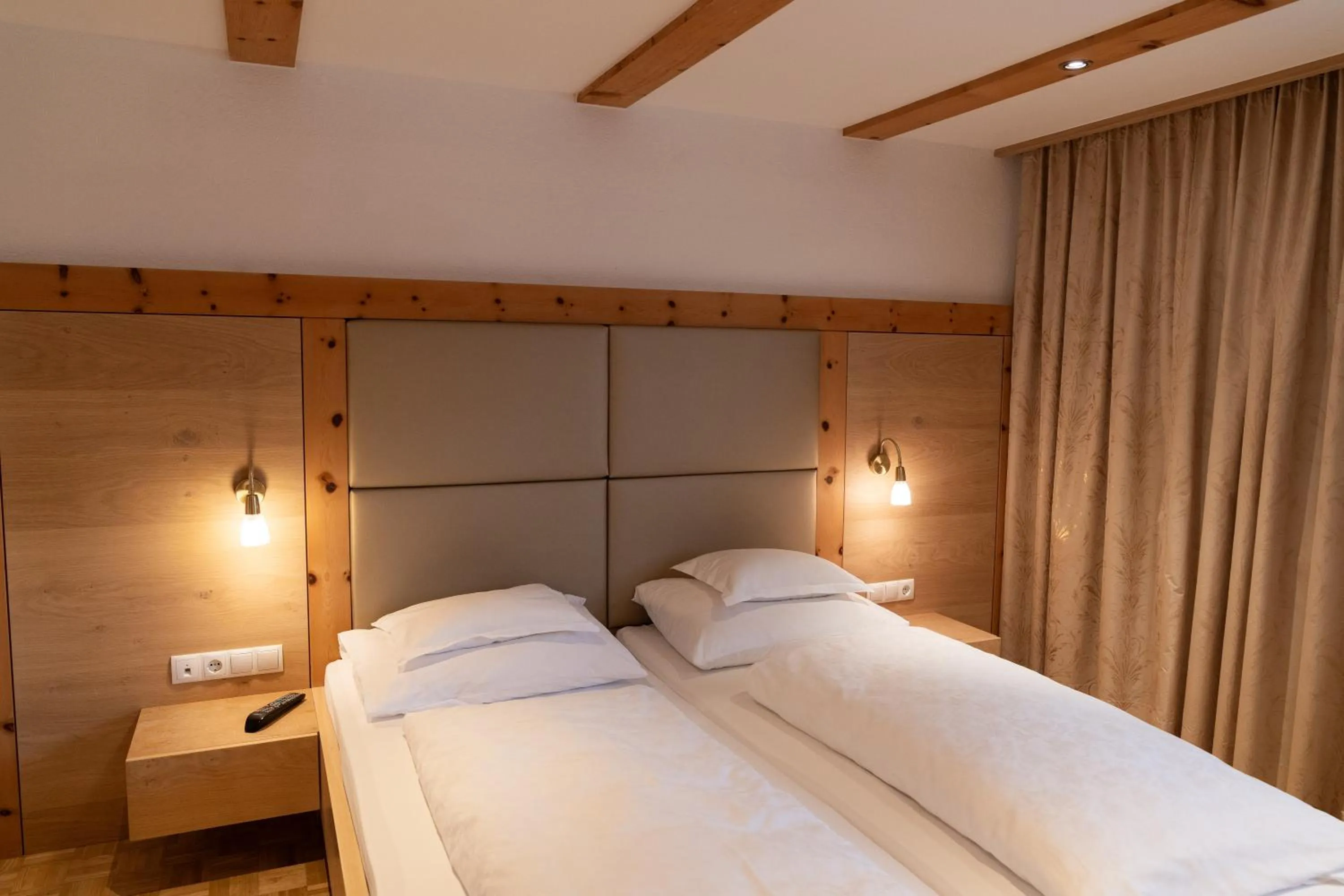 Bedroom, Bed in Wellnesshotel Mein Almhof Superior