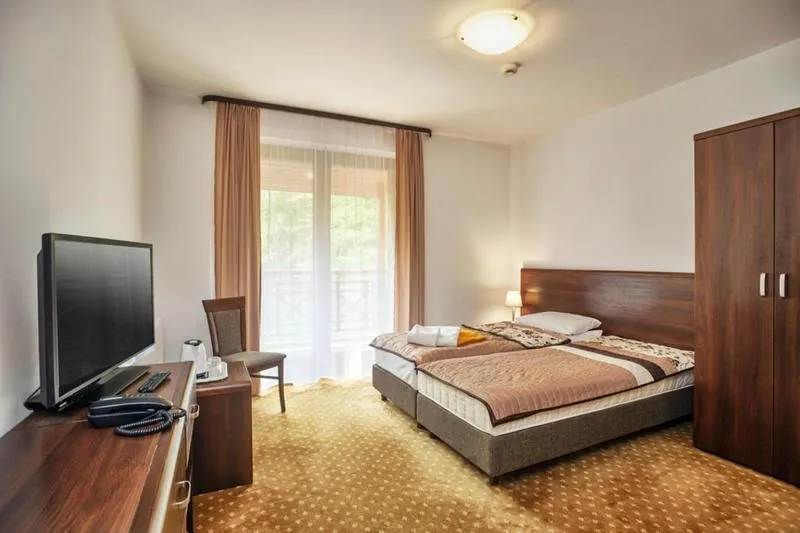 Photo of the whole room, Bed in Instytut Zdrowia Sofra FIT & SPA