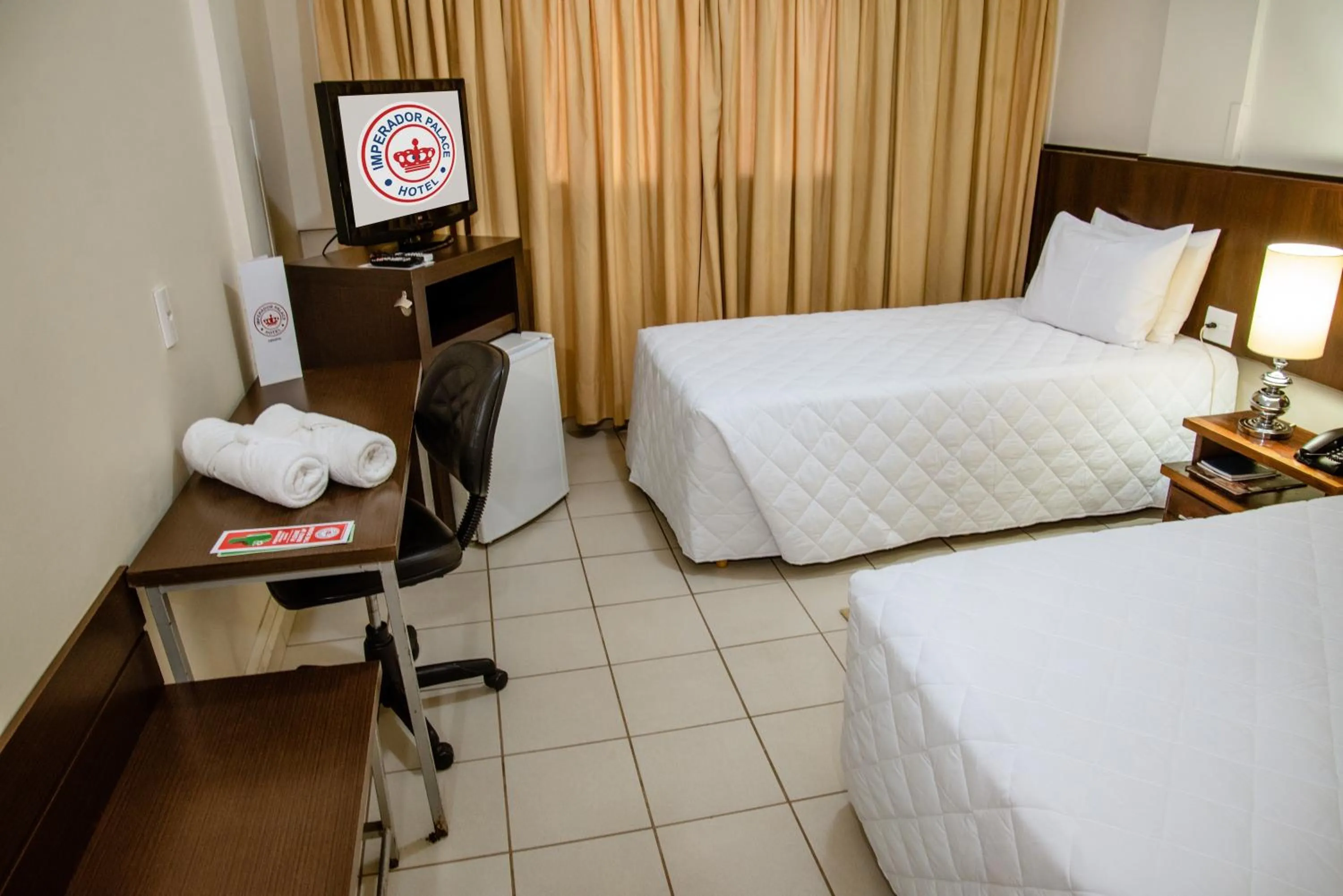 Bed in Imperador Palace Hotel Franca