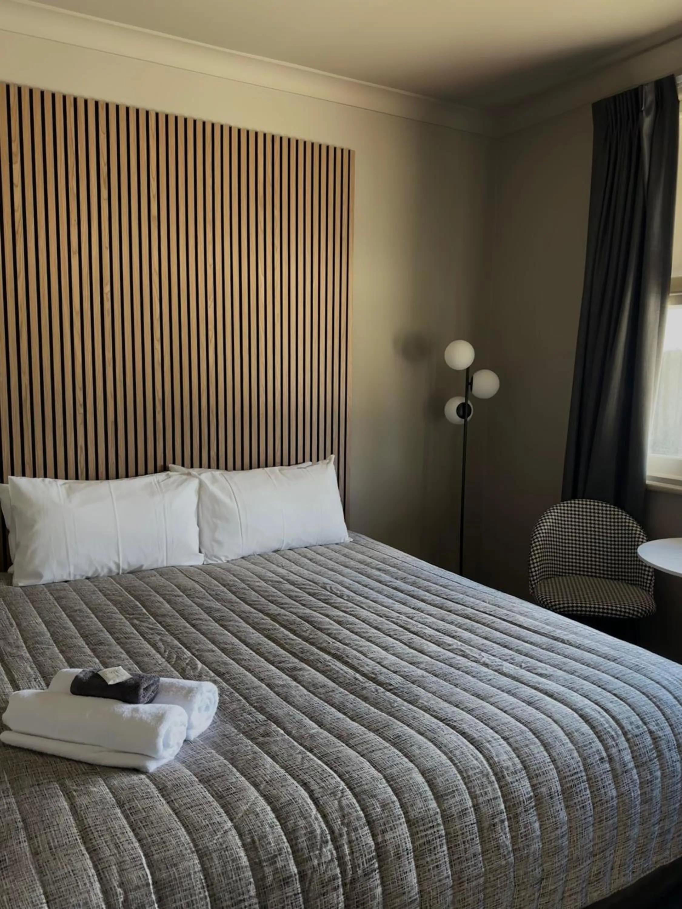 Bed in Calder Family Motel