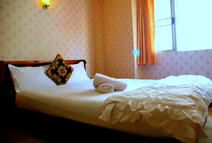 Bed in The Encore Hotel Bed in The Encore Hotel