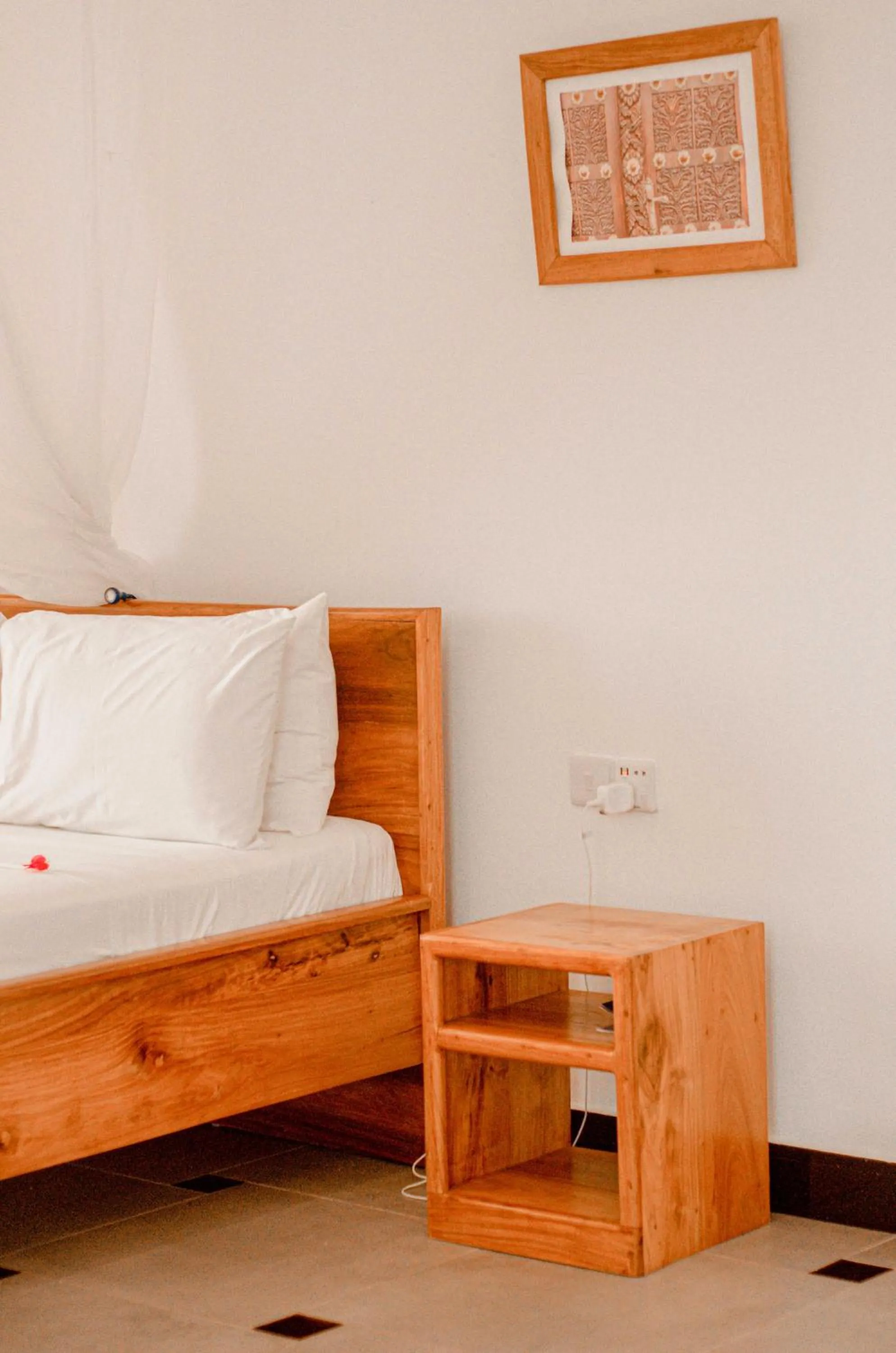 Bed in Mnarani Beach Cottages