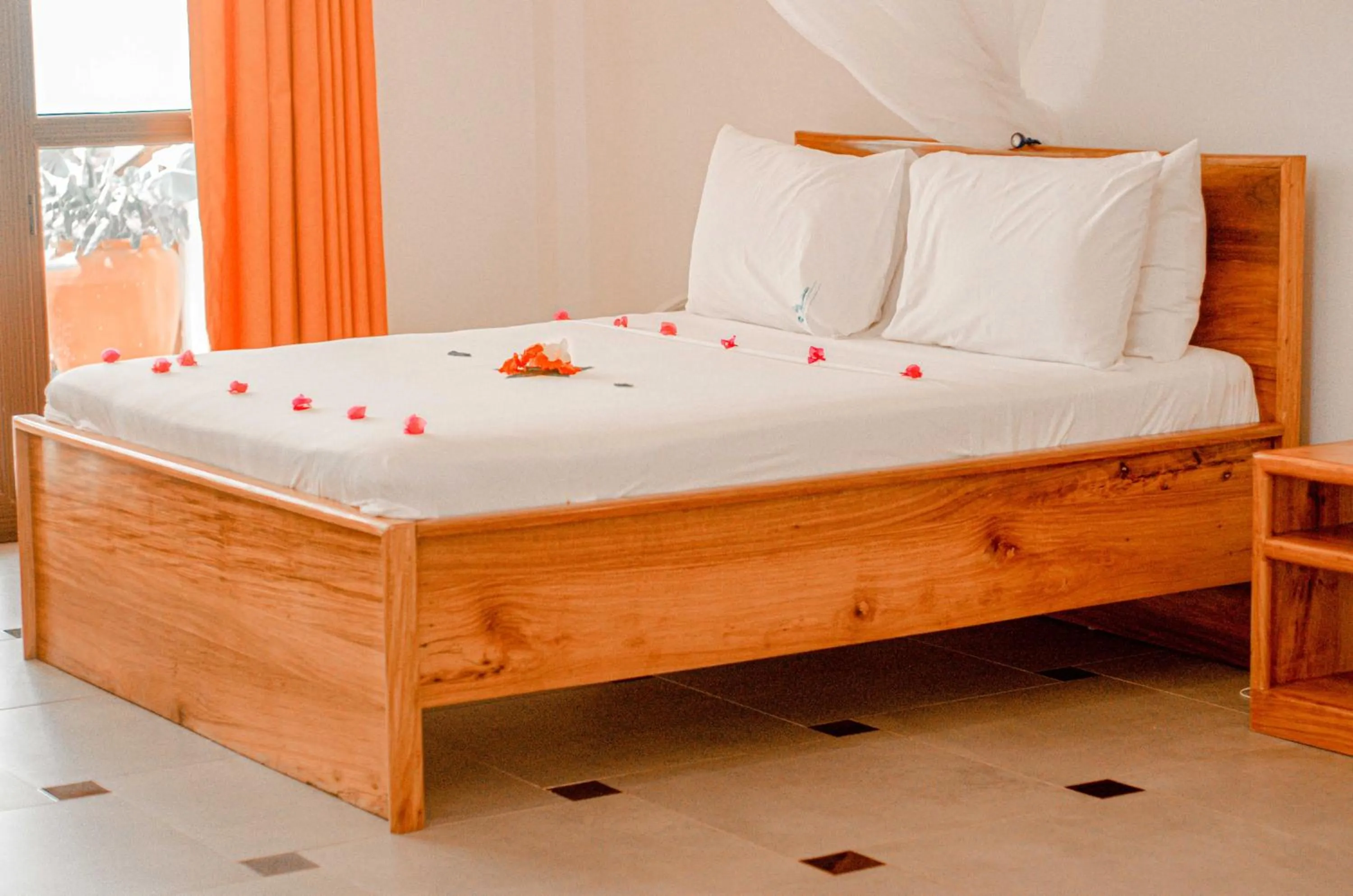 Bed in Mnarani Beach Cottages