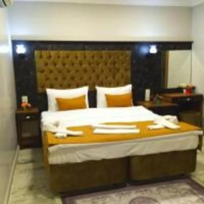 Bed in Yasin Apart hotel