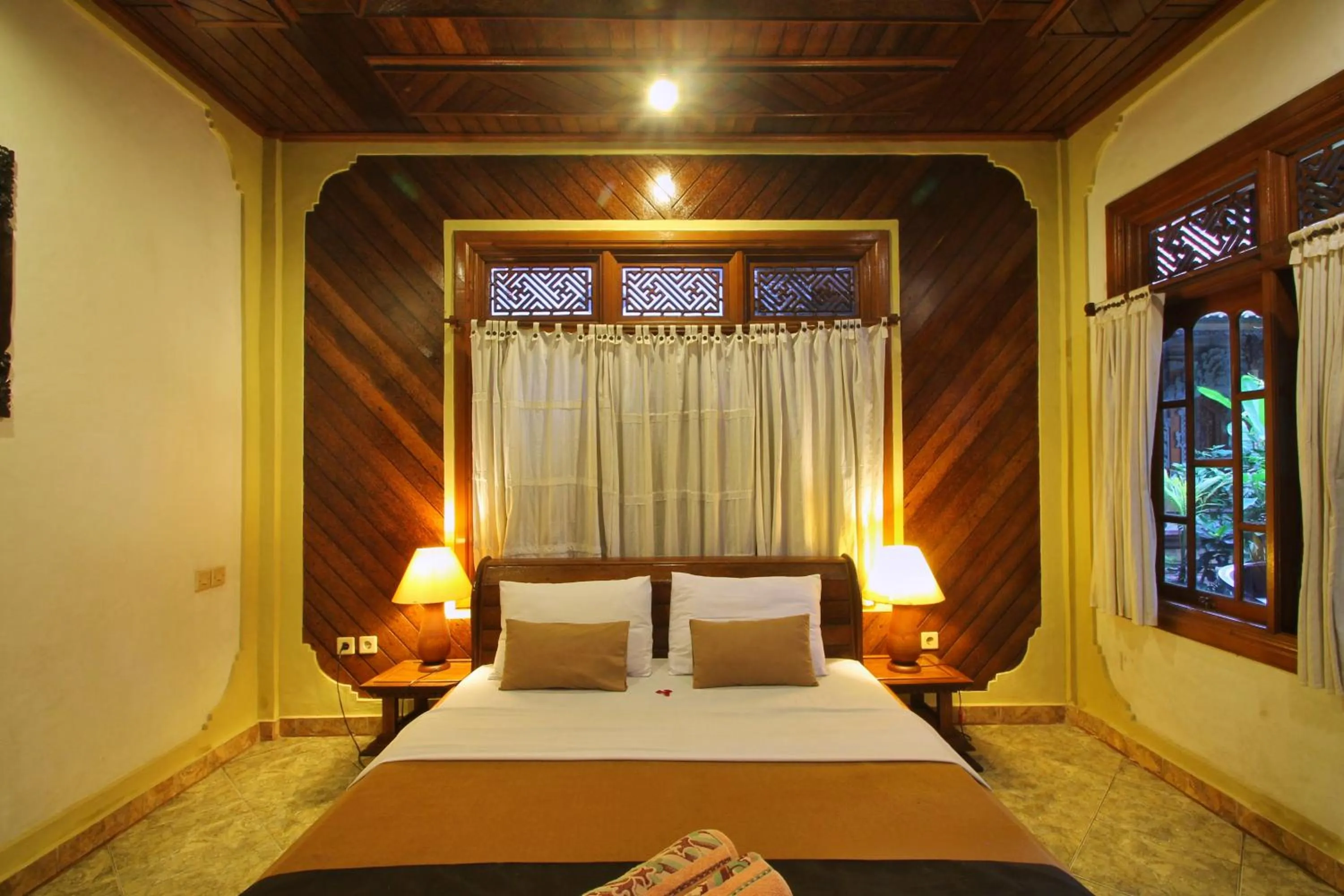 Bed in Hibiscus Cottages