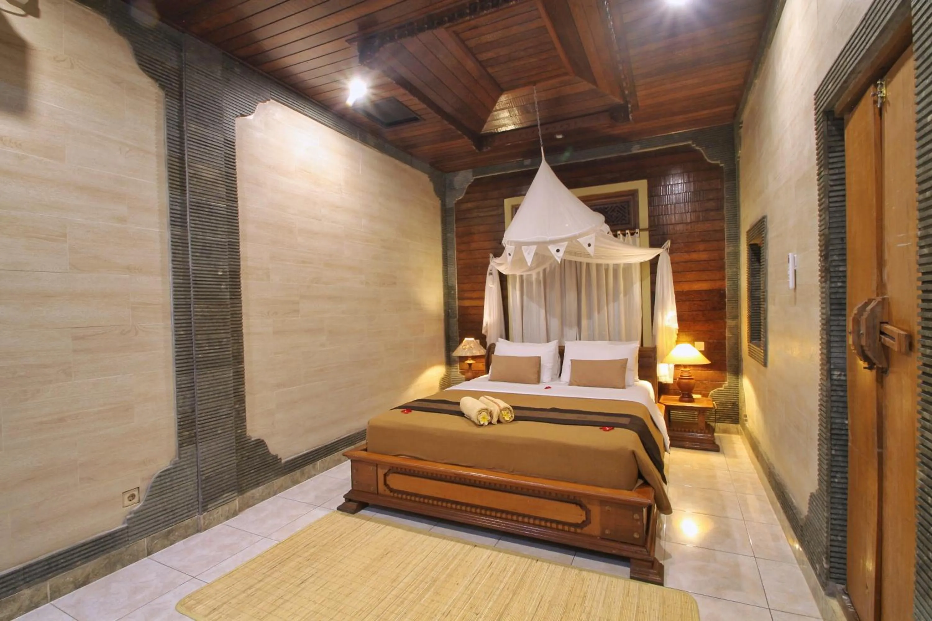 Bed in Hibiscus Cottages