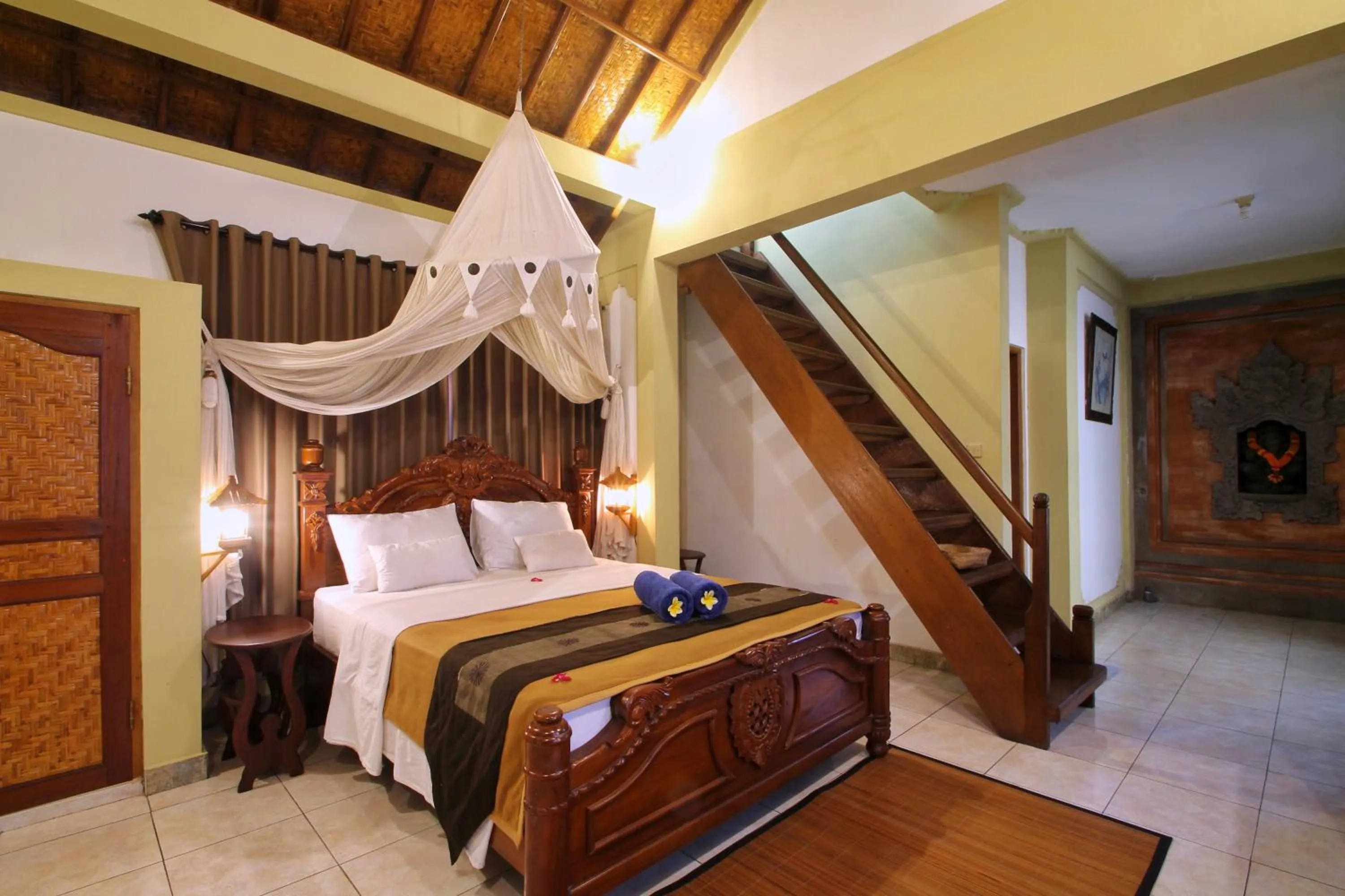 Bed in Hibiscus Cottages
