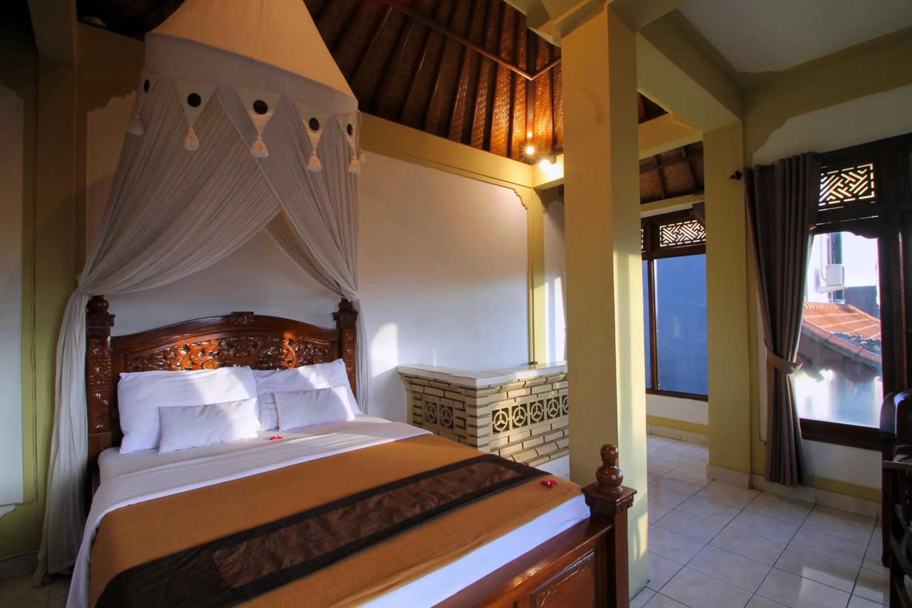 Bed in Hibiscus Cottages