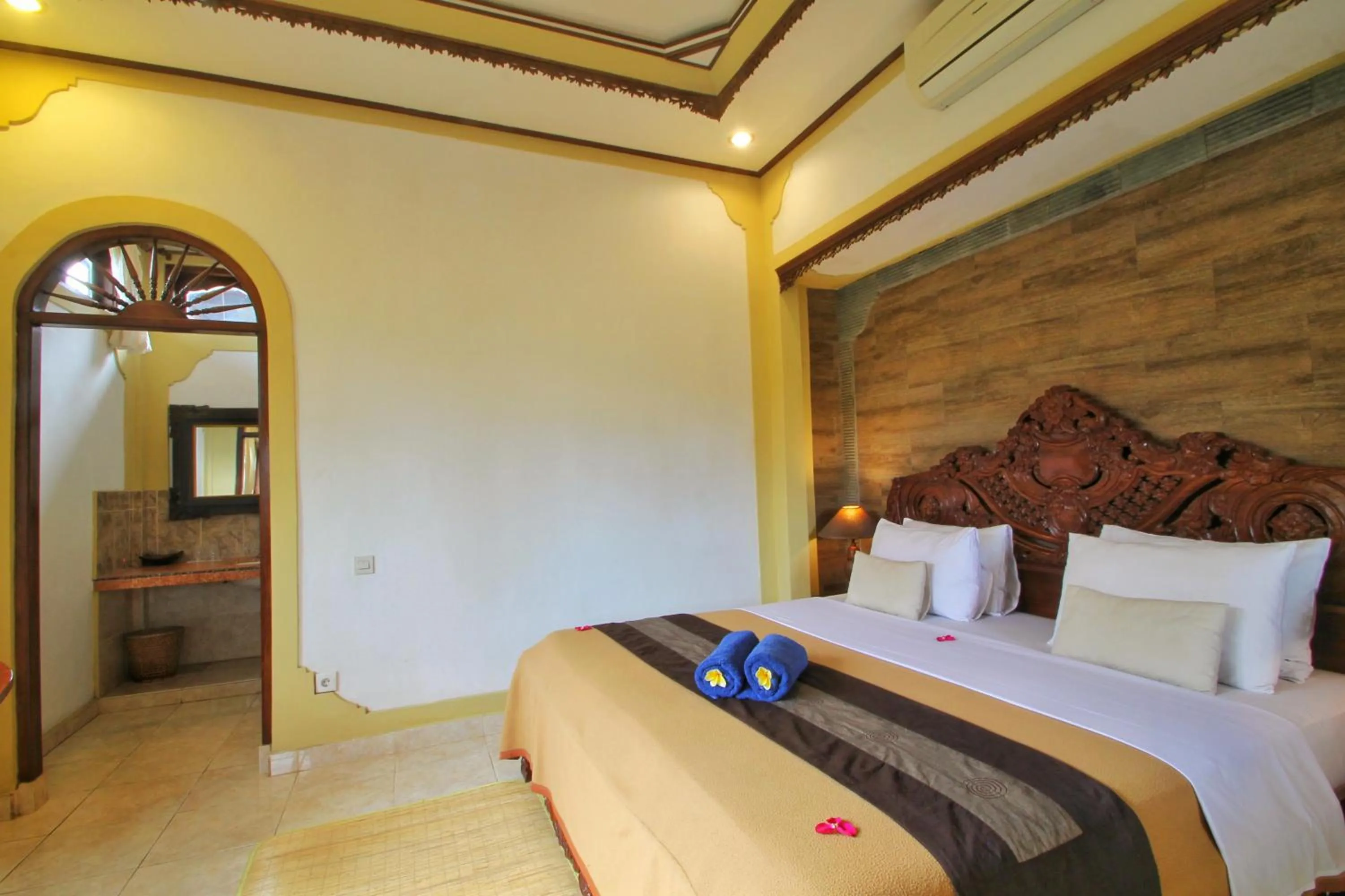 Bed in Hibiscus Cottages