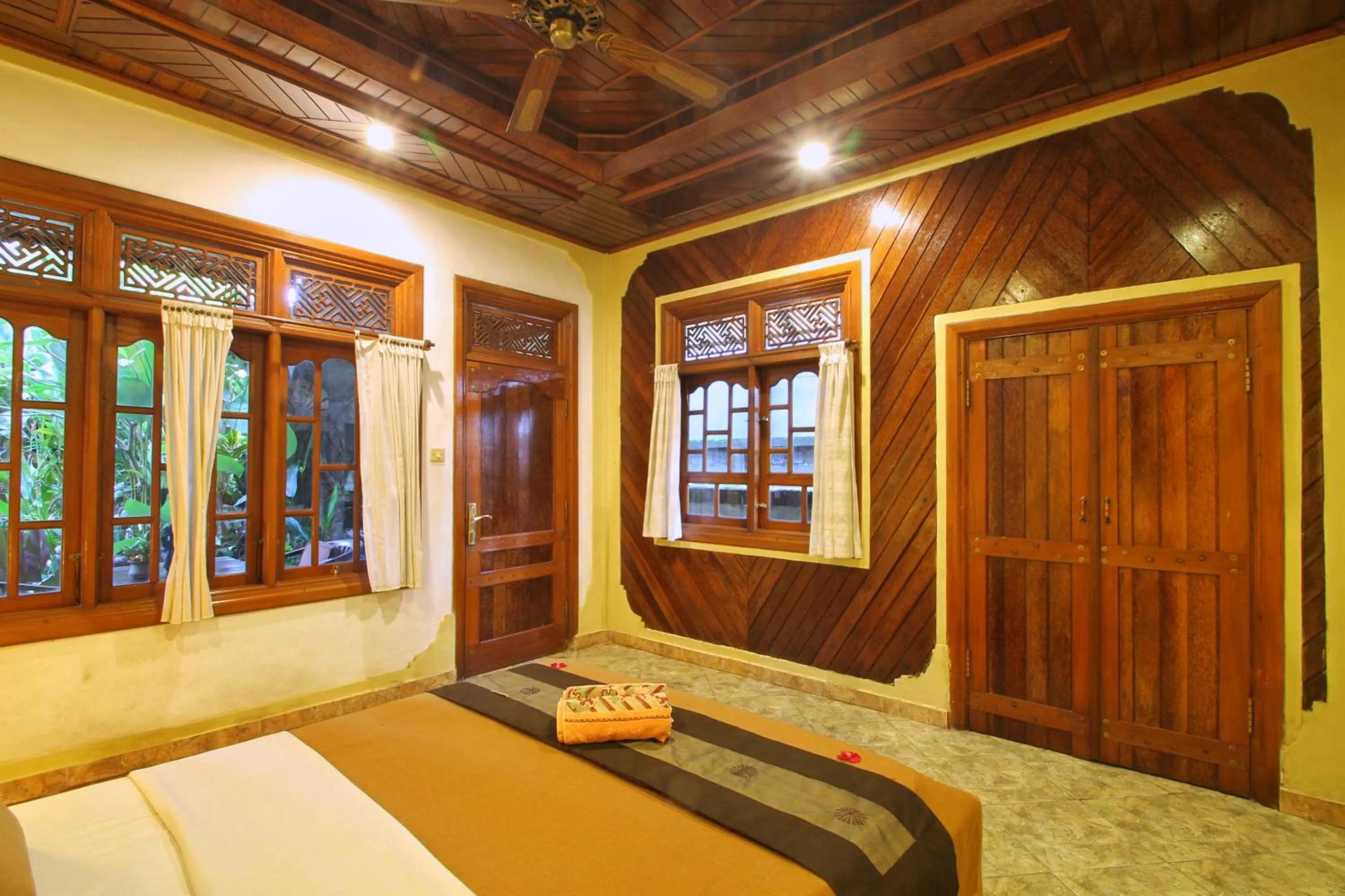 Bed in Hibiscus Cottages