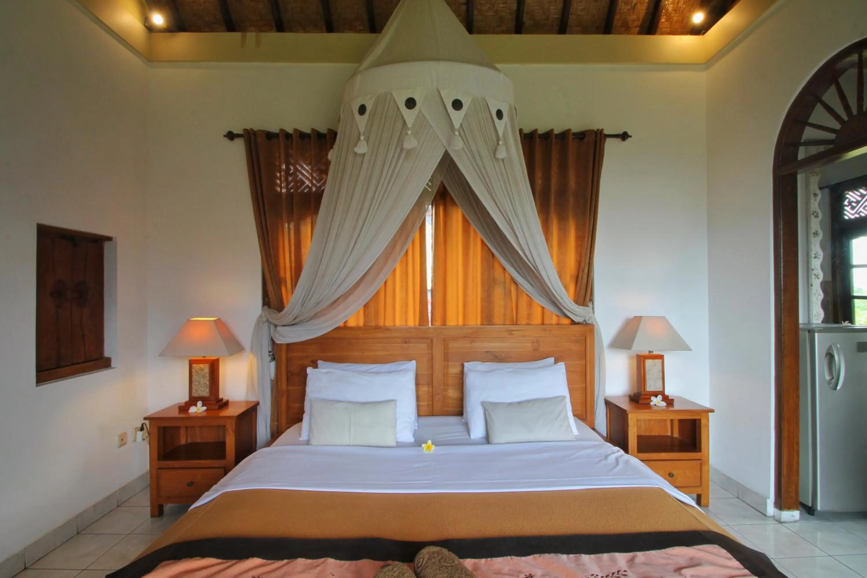 Bed in Hibiscus Cottages